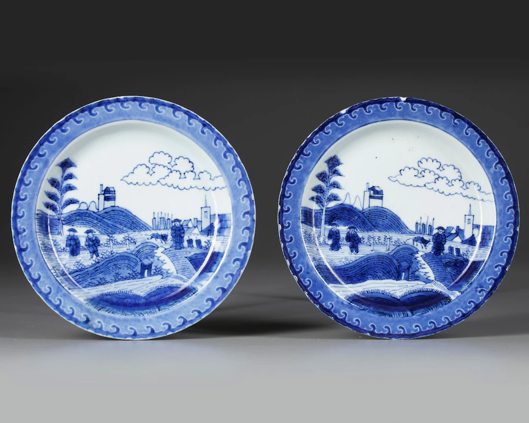 A PAIR OF CHINESE BLUE AND WHITE 'SCHEVENINGEN' PLATES, KANGXI (1662-1722)