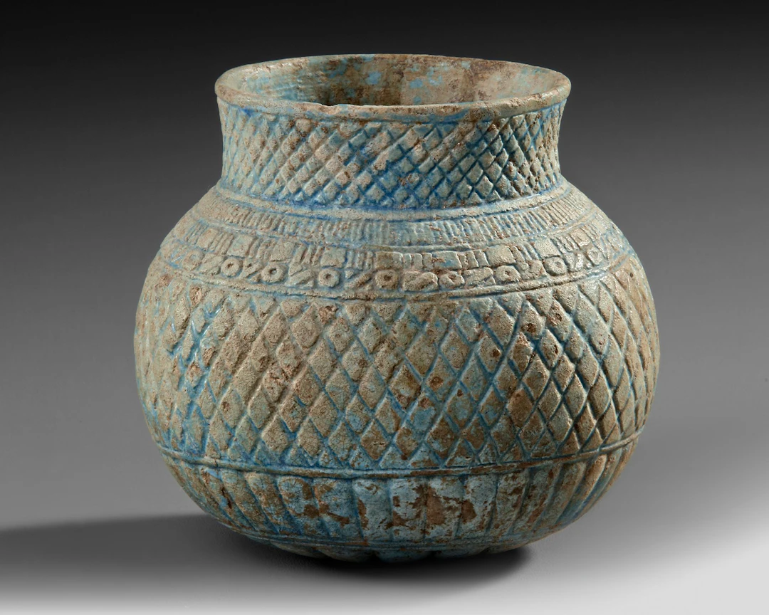 A SQUAD CERAMIC VESSEL