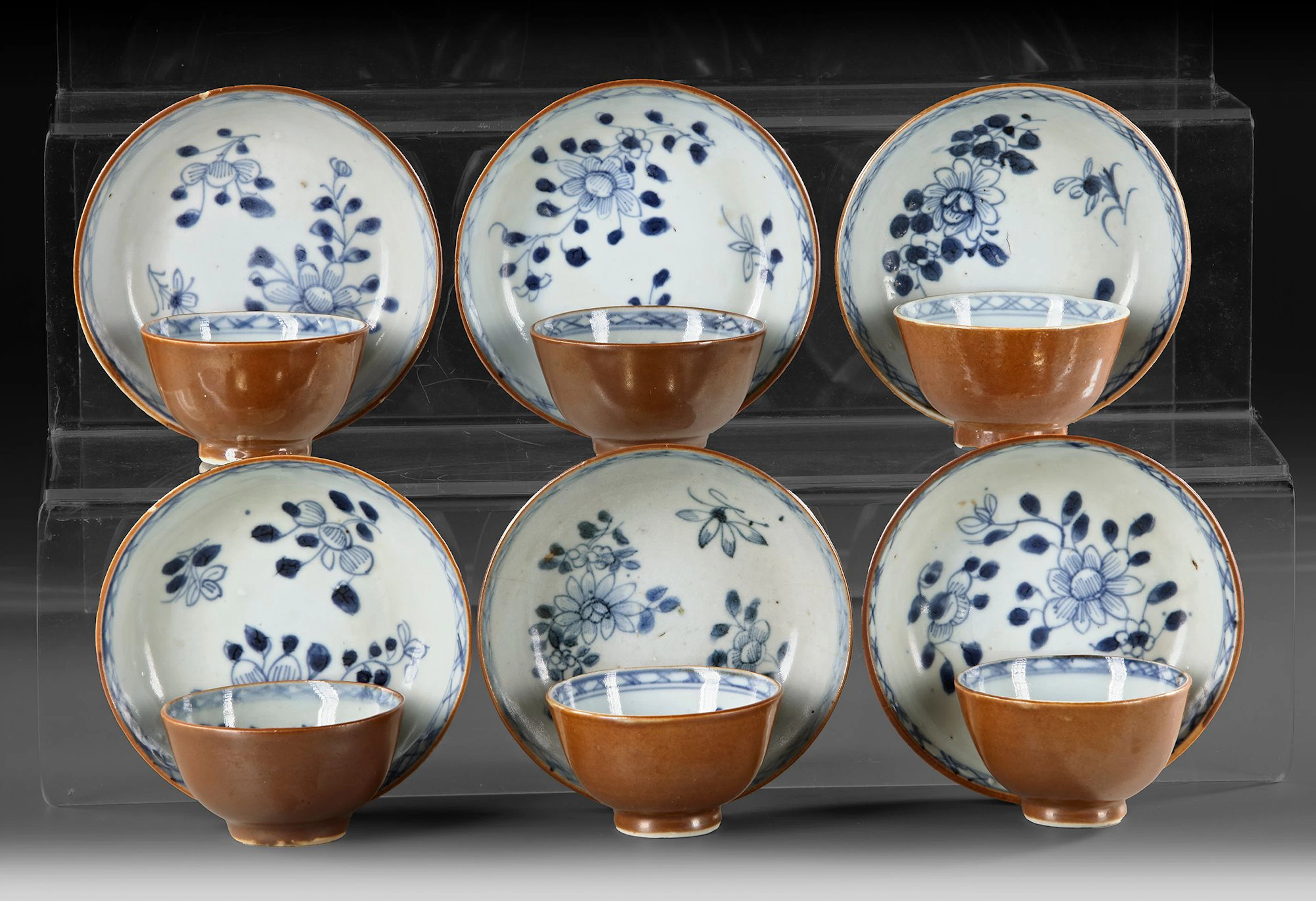 SIX CHINESE BLUE AND WHITE CAFÉ-AU-LAIT CUPS AND SAUCERS, 18TH CENTURY