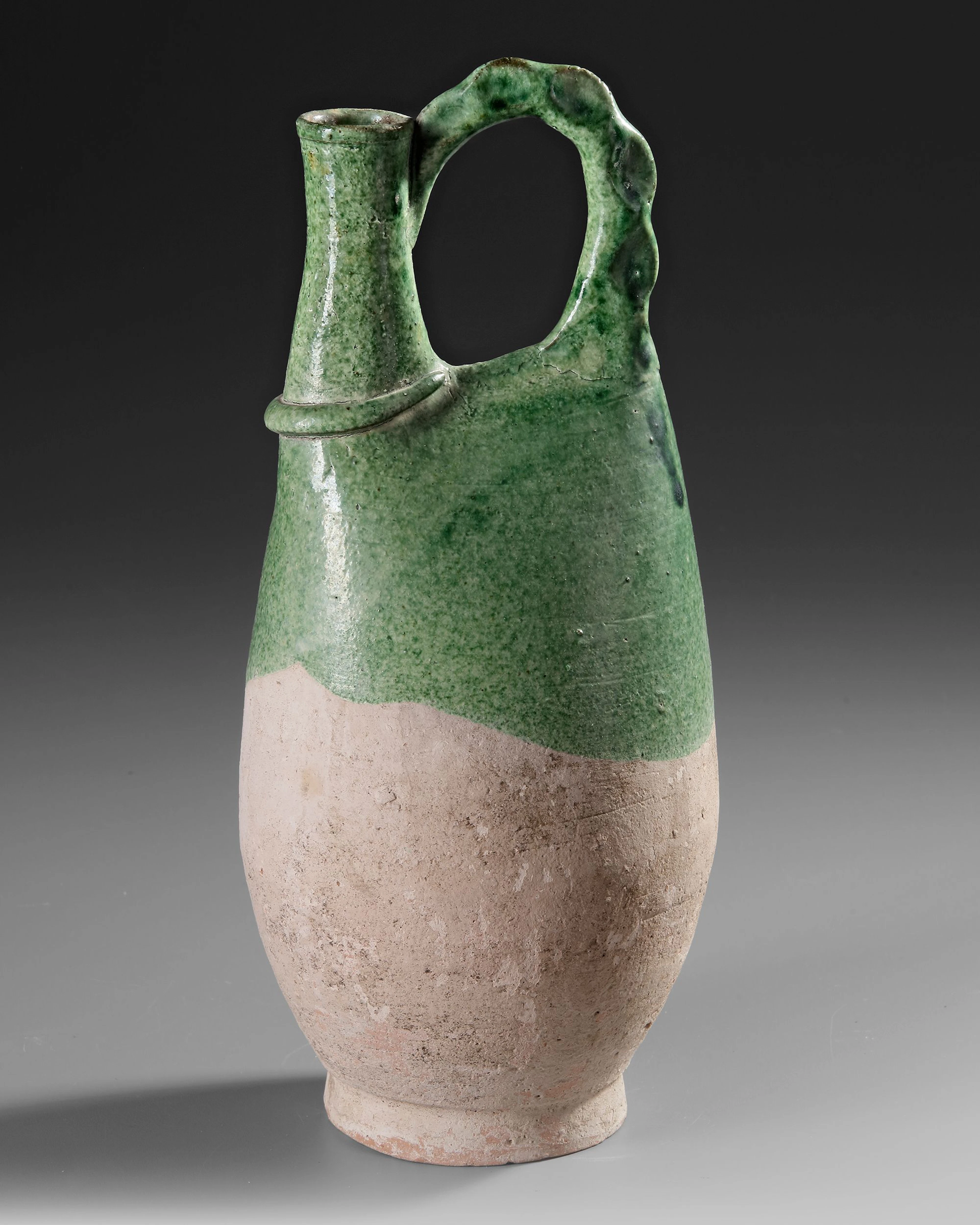 A CHINESE GREEN-GLAZED POTTERY FLASK, LIAO DYNASTY (AD 907-1125)
