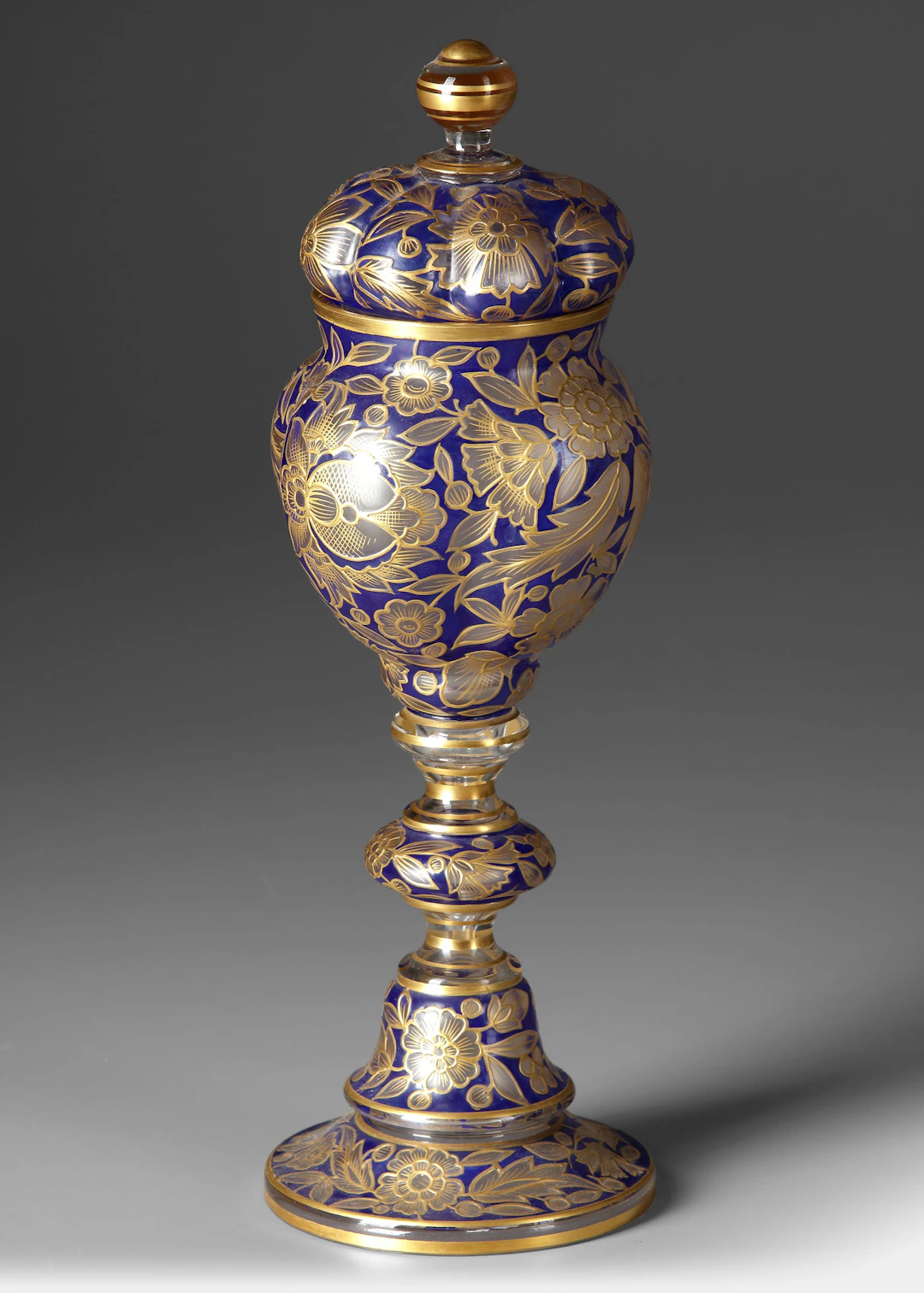 A COBALT-BLUE GLASS COVERED VESSEL, 19TH CENTURY