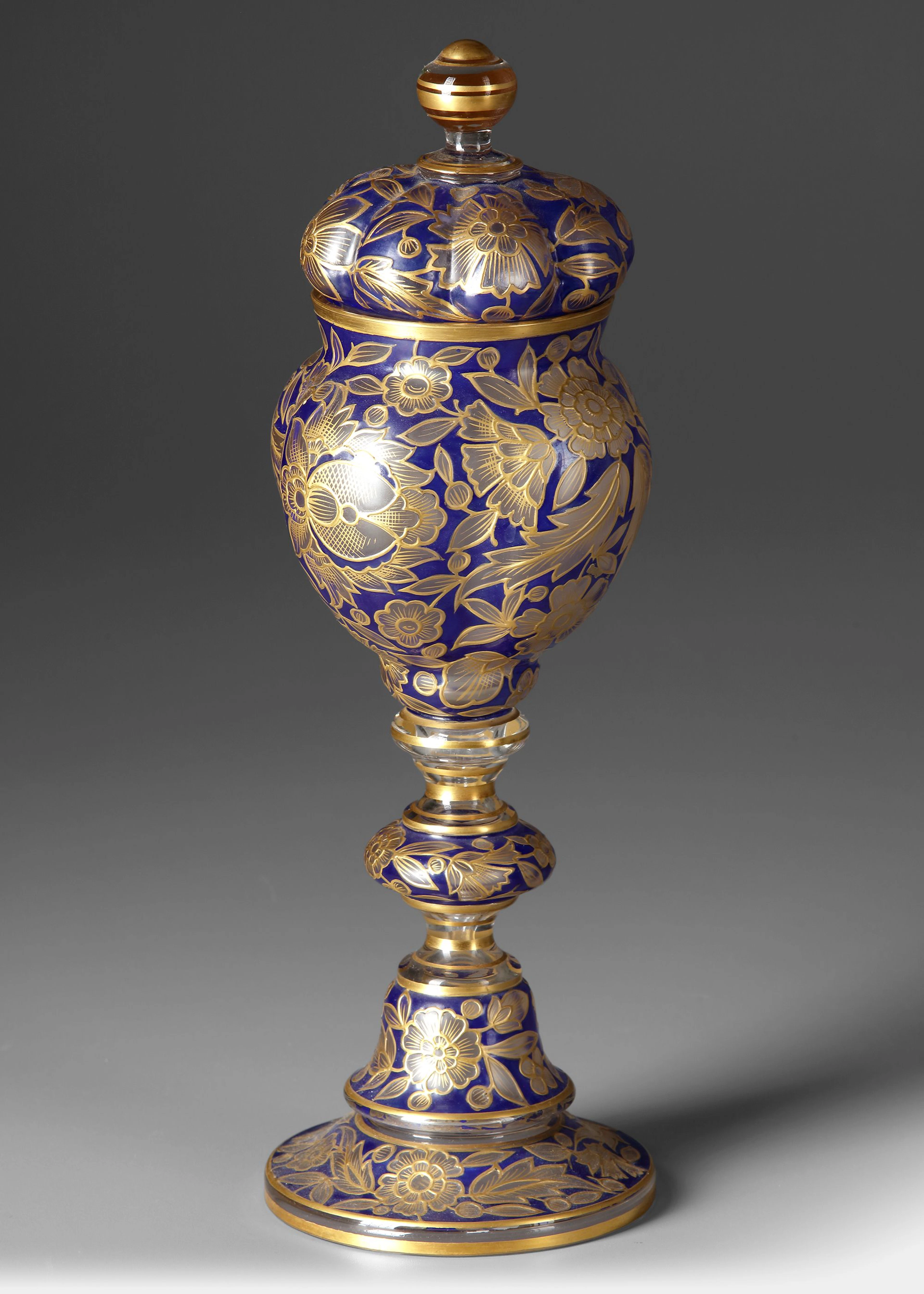 A COBALT-BLUE GLASS COVERED VESSEL, 19TH CENTURY