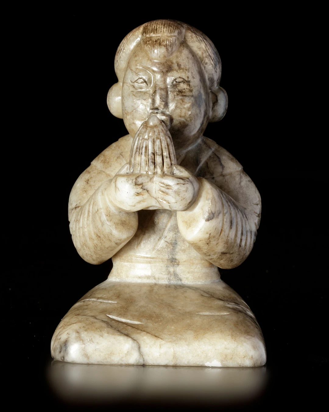 A CREAMY WHITE JADE OF A SHENG-PLAYING MUSICIAN, CHINA, HAN DYNASTY
