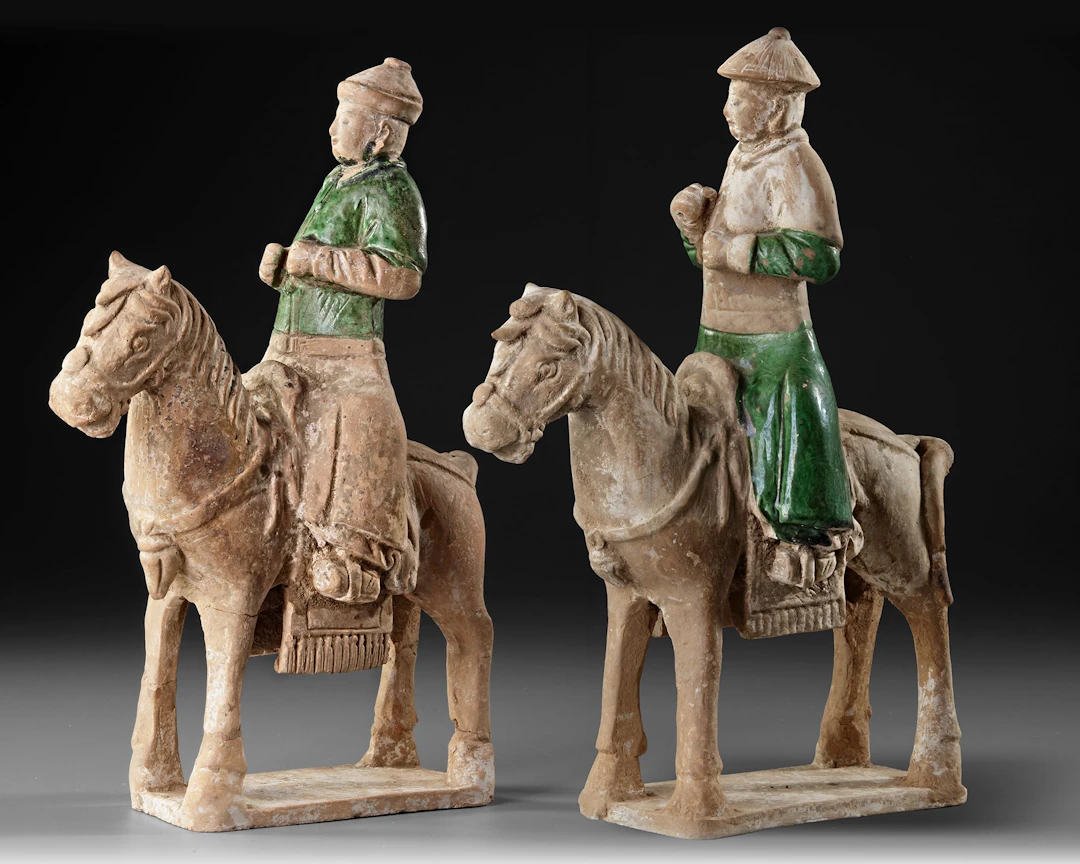 A PAIR OF RIDERS ON HORSES, MING DYNASTY (1368-1644)