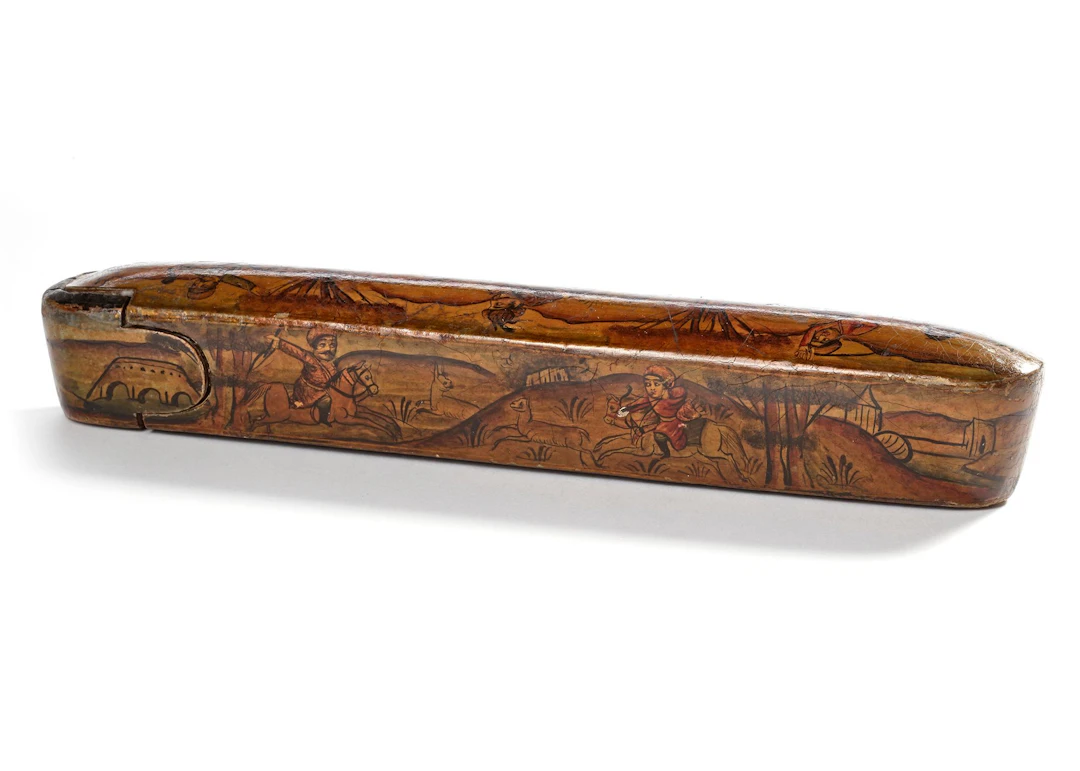 A QAJAR LACQUERED PAPIER-MACHÉ PEN CASE (QALAMDAN), 19TH CENTURY