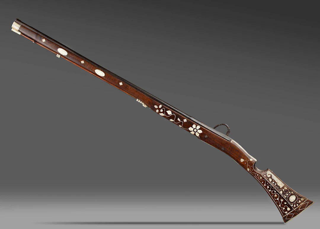 A BONE INLAID MATCHLOCK MUSKET, 19TH-20TH CENTURY