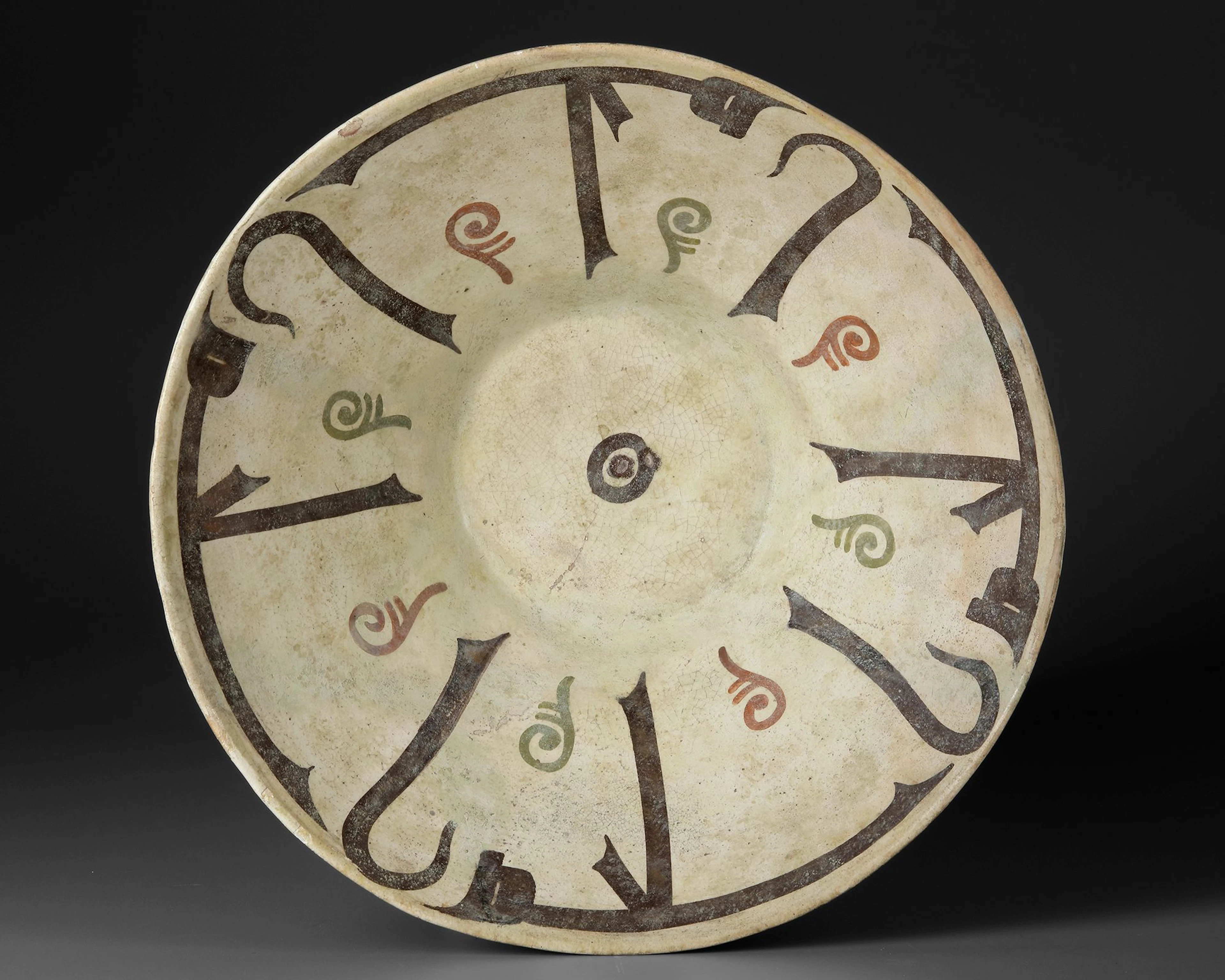 A NISHAPUR CALLIGRAPHIC POTTERY BOWL, PERSIA, 10TH CENTURY