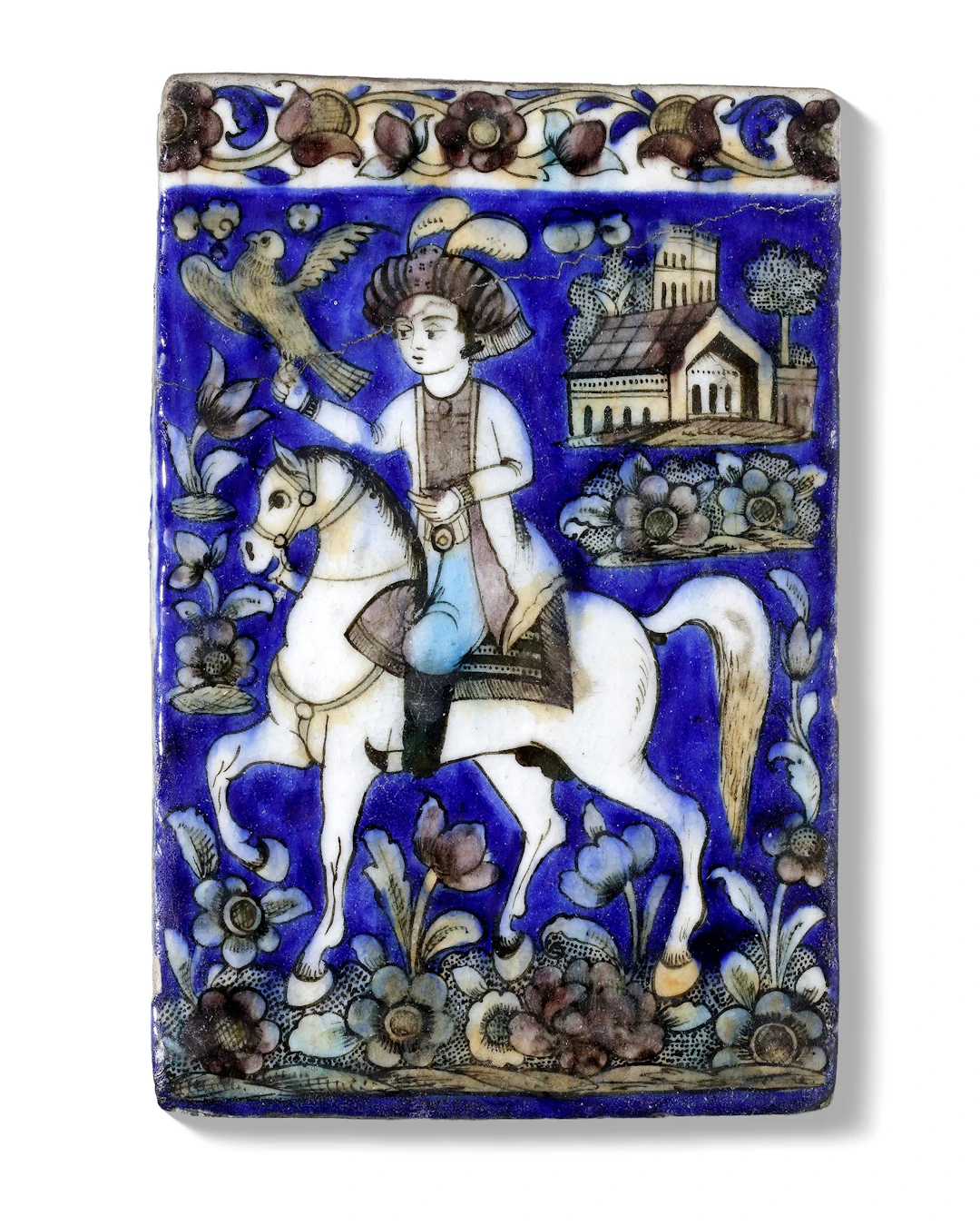 A POLYCHROME MOULDED POTTERY TILE, PERSIA QAJAR, 19TH CENTURY