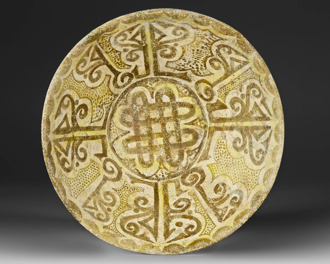 A NISHAPUR POTTERY BOWL, PERSIA 10TH-11TH CENTURY