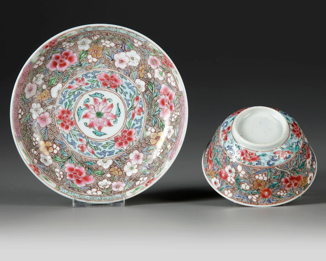 A CHINESE FAMILLE ROSE CUP AND SAUCER, 18TH CENTURY