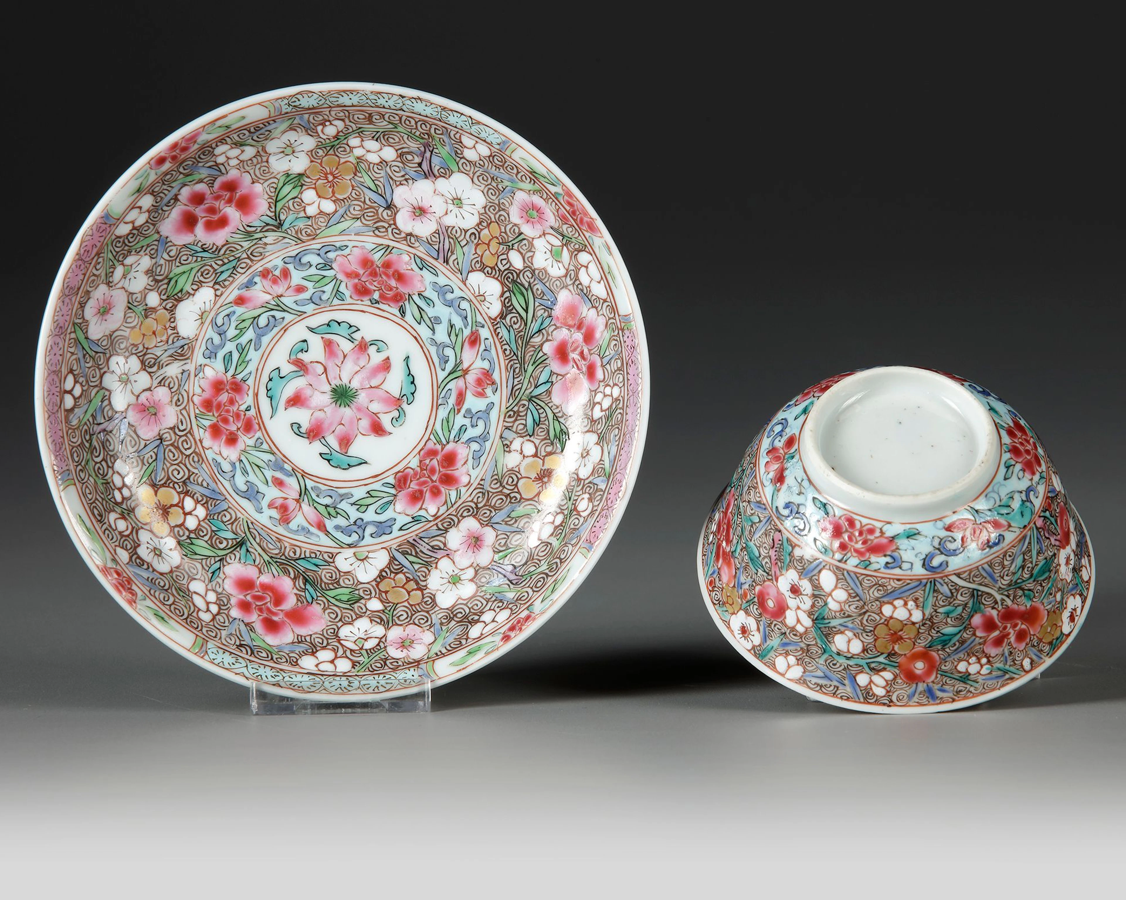 A CHINESE FAMILLE ROSE CUP AND SAUCER, 18TH CENTURY