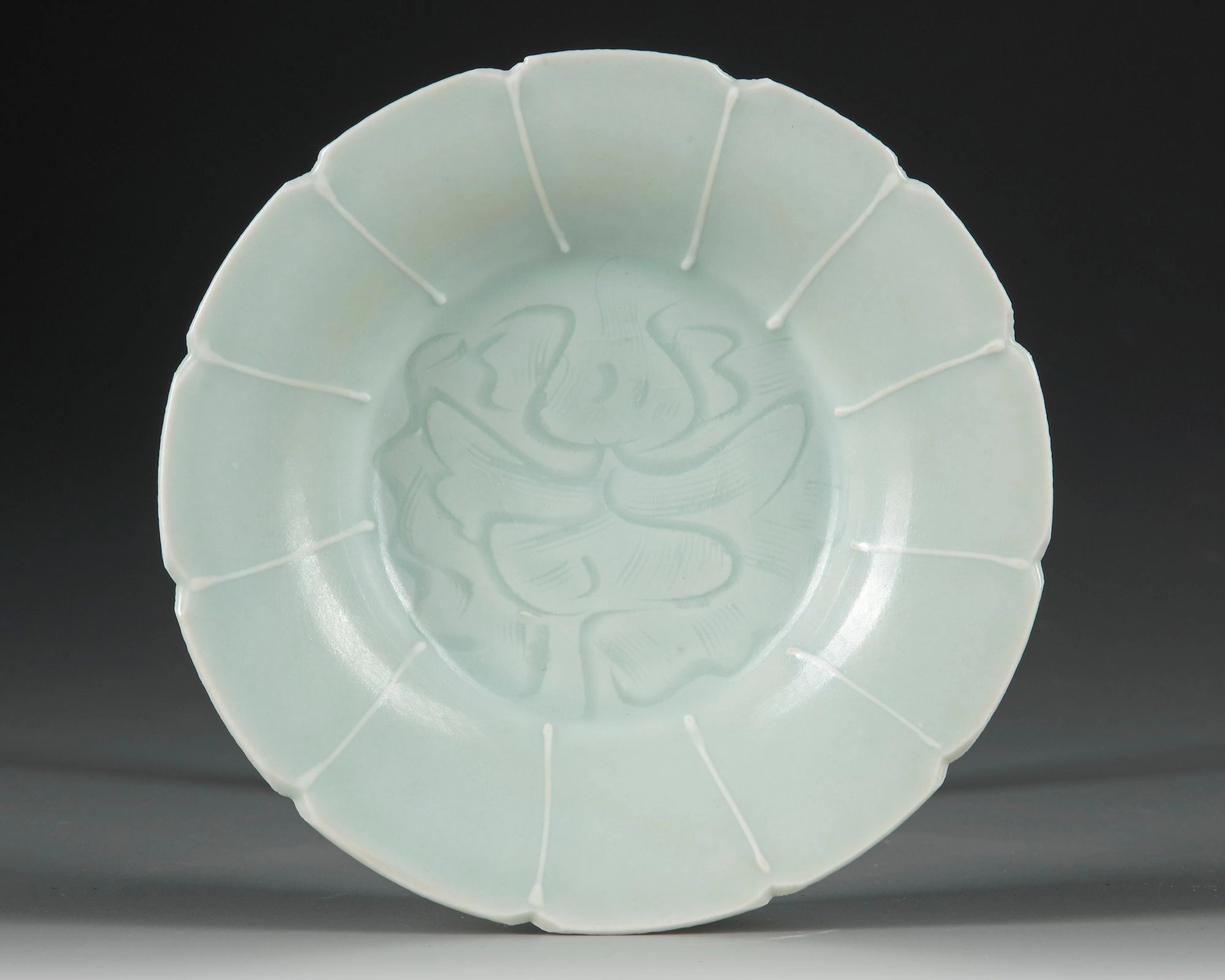 A CHINESE QINGBAI LOBED 'FLORAL' DISH, SONG DYNASTY (960-1279 AD)