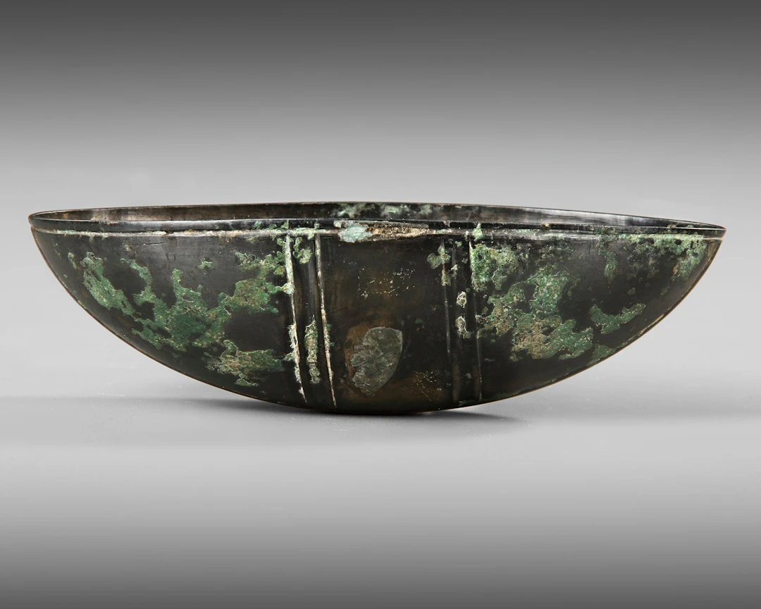 A BRONZE SASSANIAN CUP, 6TH CENTURY AD