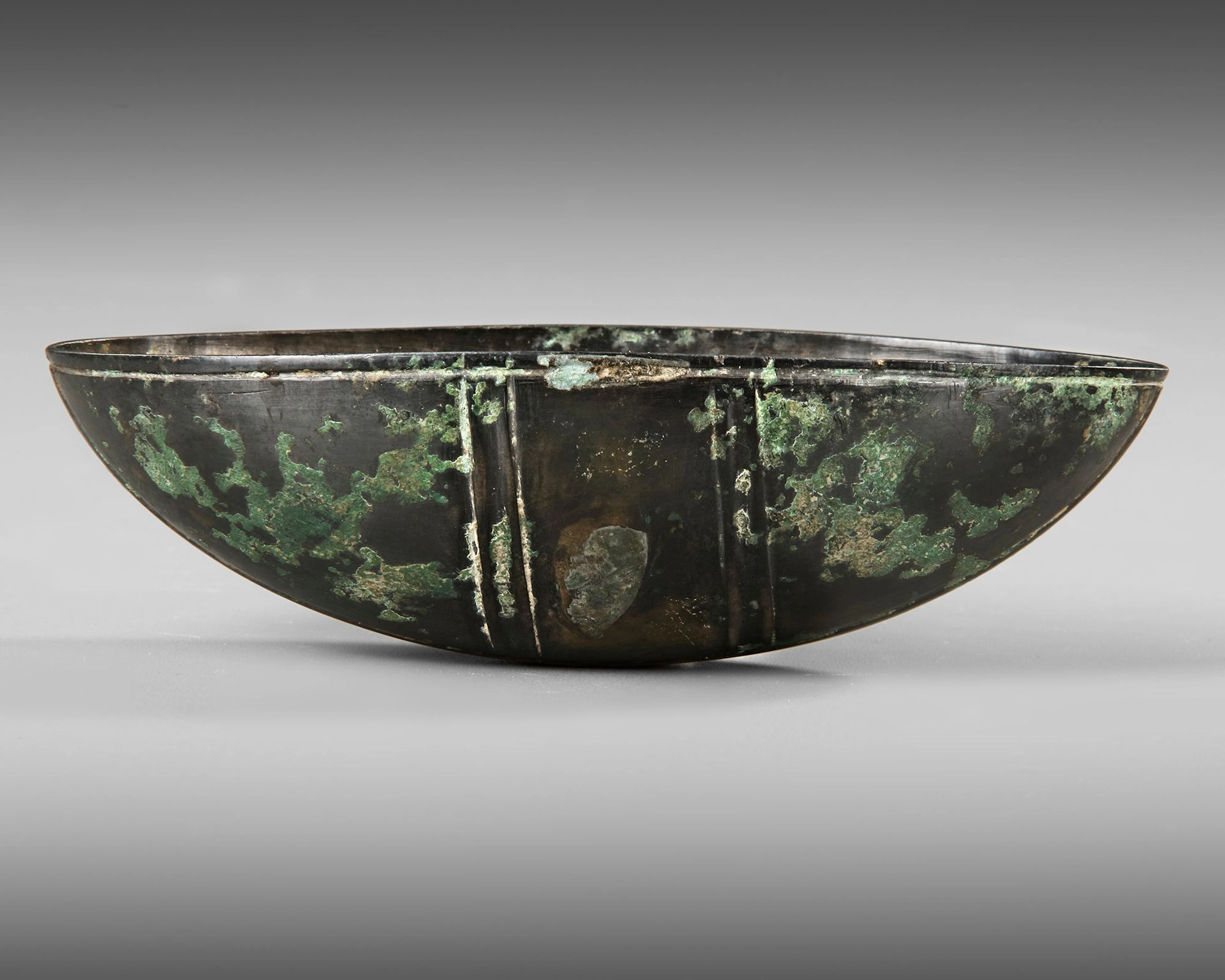 A BRONZE SASSANIAN CUP, 6TH CENTURY AD