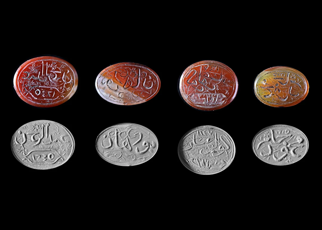 FOUR AGATE SEALS, PERSIA QAJAR, EARLY 19TH CENTURY