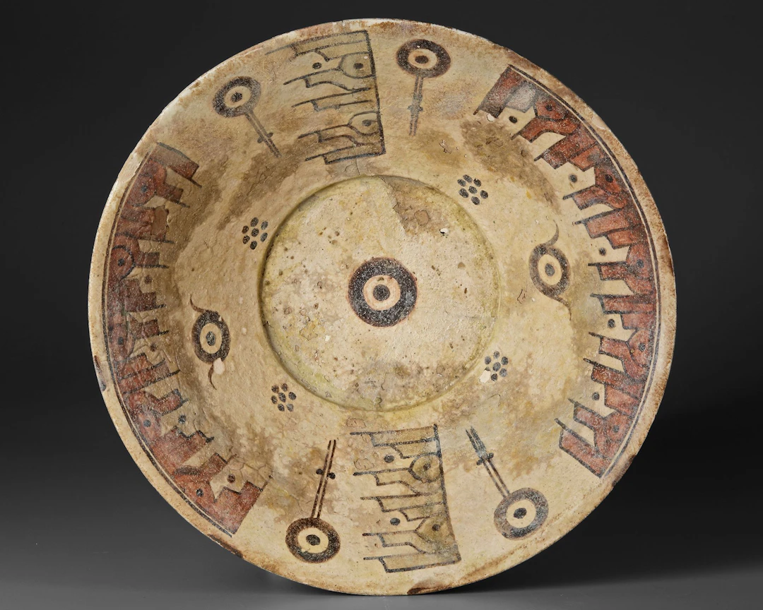 A LARGE NISHAPUR POTTERY BOWL, PERSIA 10TH CENTURY