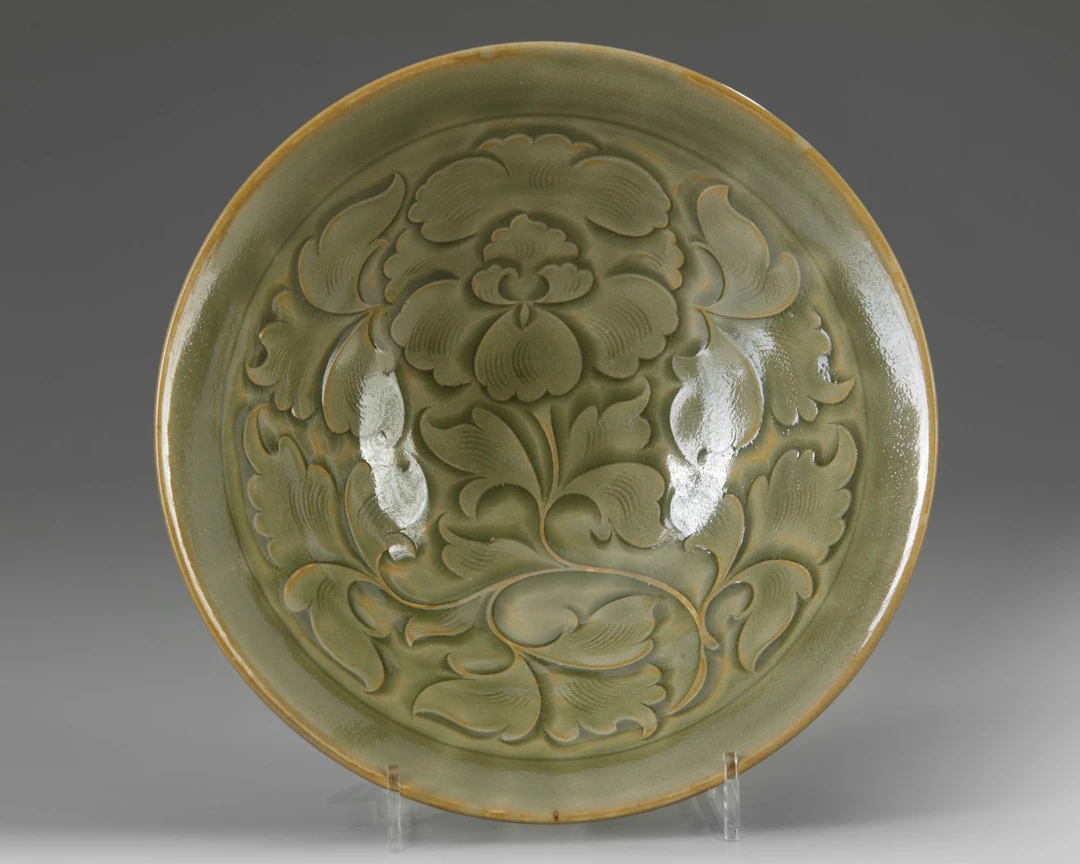 A CHINESE YAOZHOU-STYLE CELADON GLAZED CONICAL BOWL,QING DYNASTY (1644–1911)