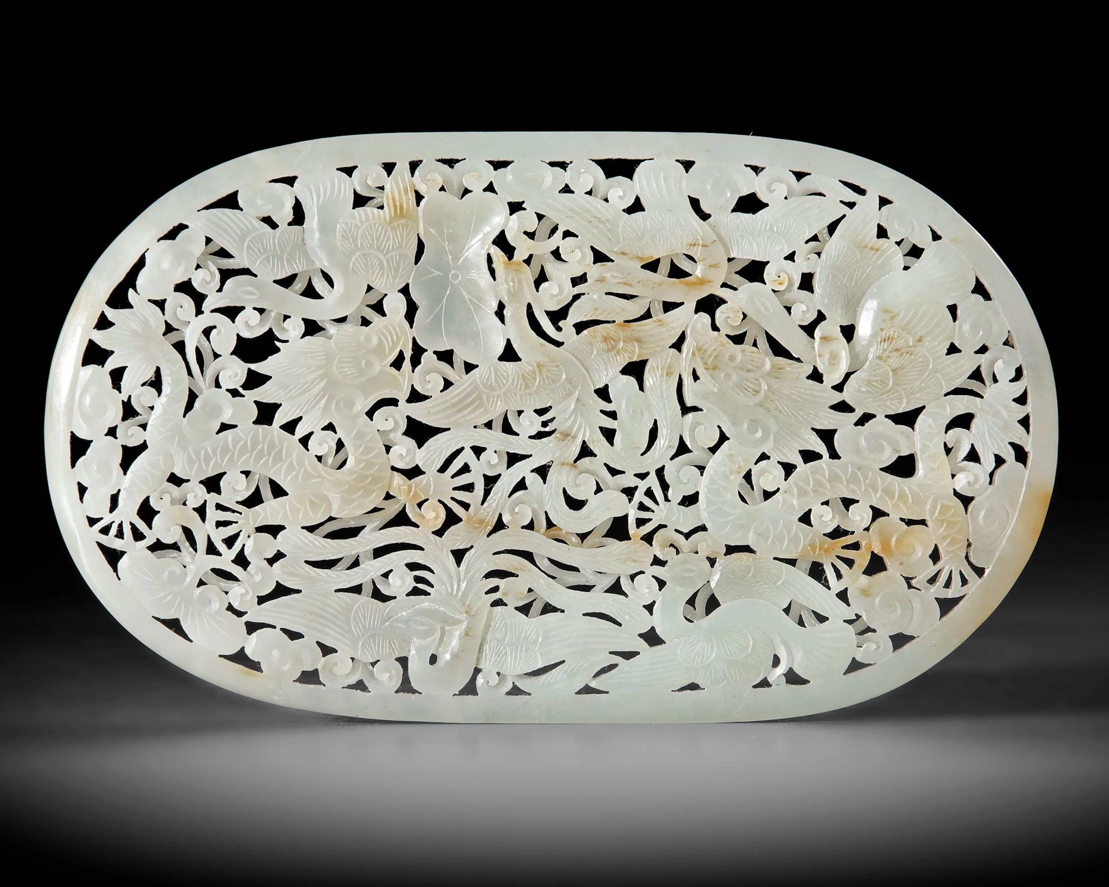 A CHINESE JADE OPENWORK DRAGON PLAQUE, 19TH CENTURY