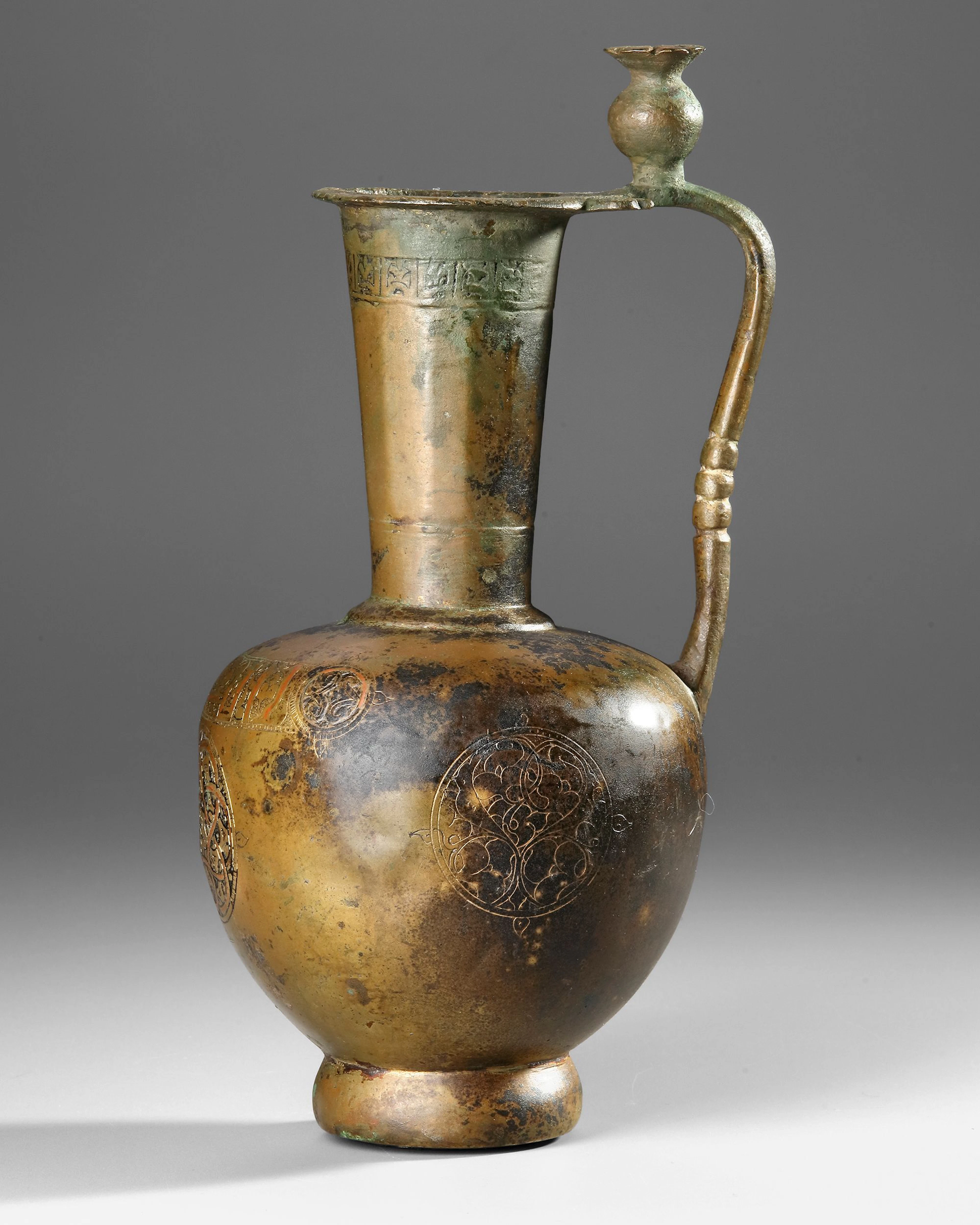 A KHORASAN BRONZE EWER, NORTH EAST PERSIA, 12TH CENTURY