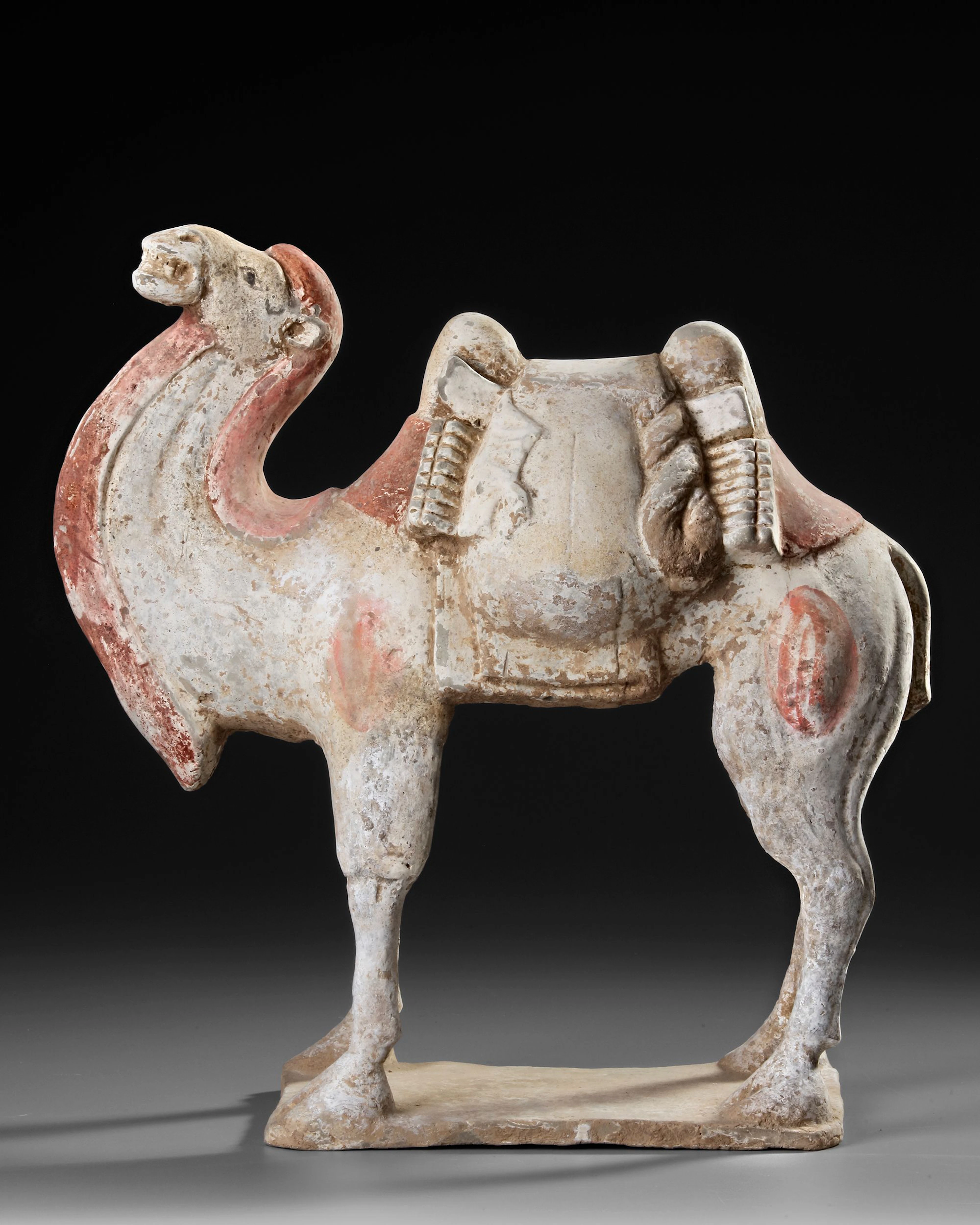 A CHINESE TERRACOTTA CAMEL, TANG DYNASTY (618-907 AD)