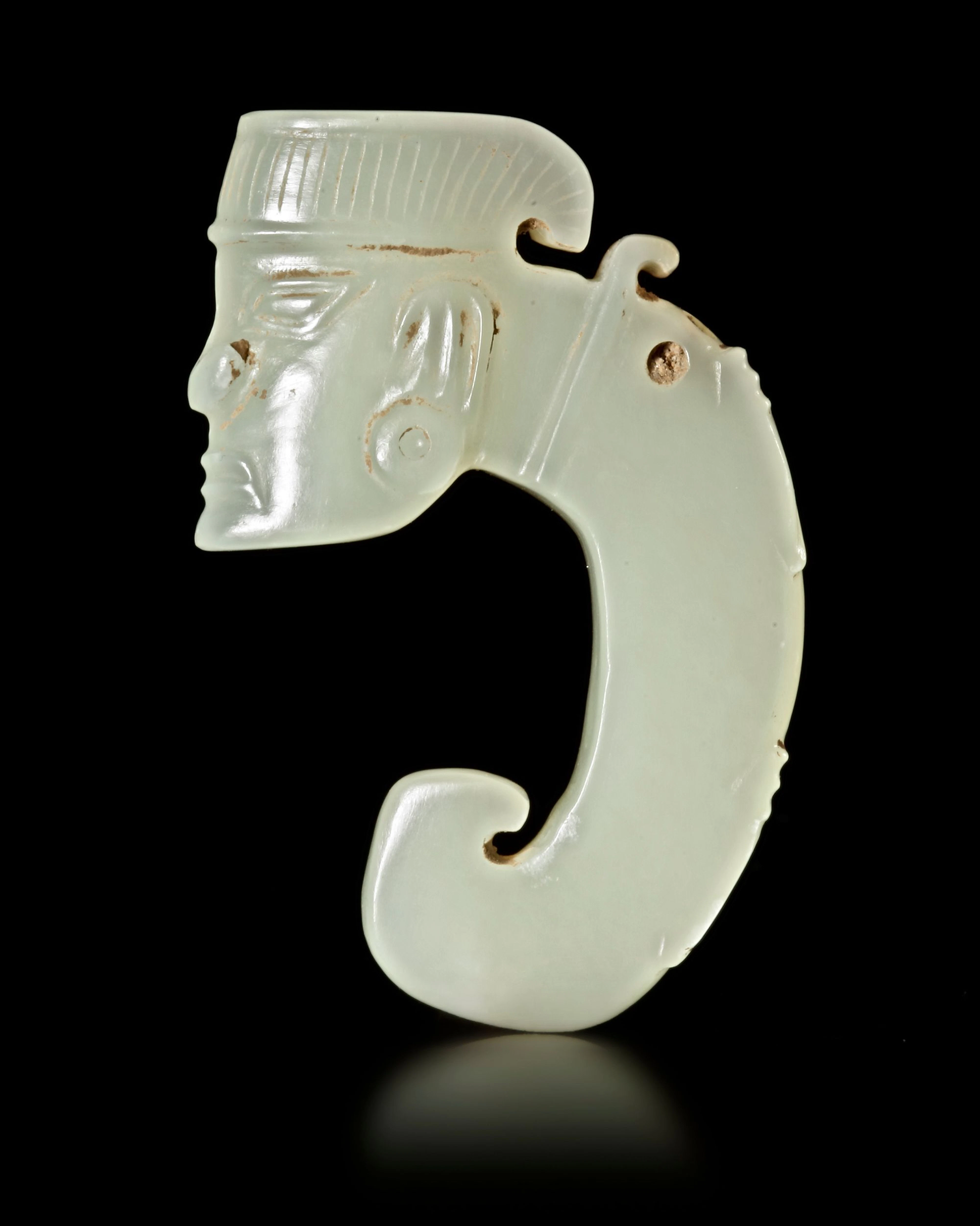 A WHITE JADE DRAGON PENDANT WITH A HUMAN HEAD, CHINA, SHANG DYNASTY