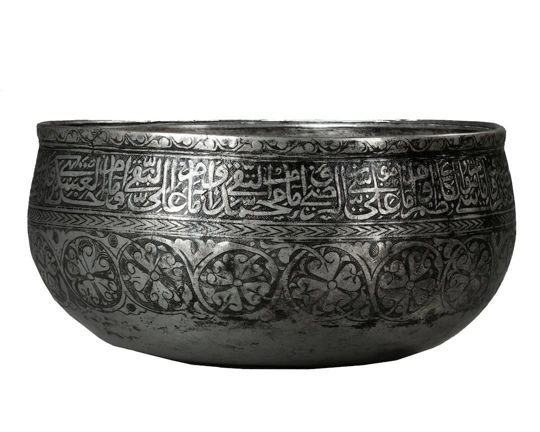 A TIMURID ENGRAVED METAL BOWL, 14TH CENTURY