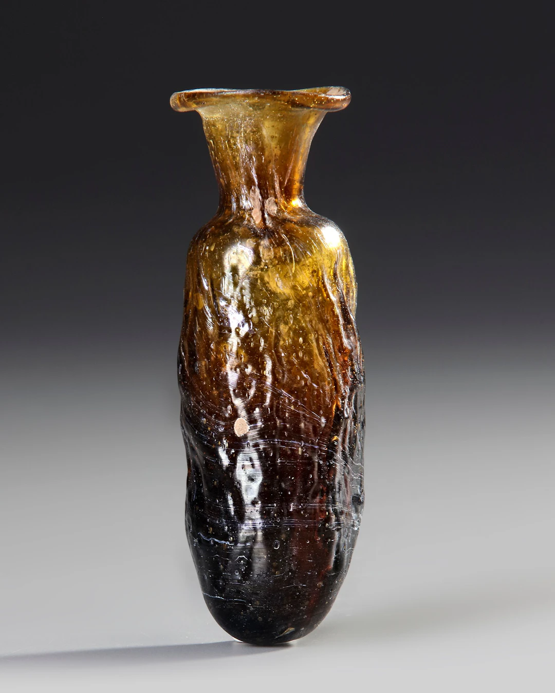 A SIDONIAN MOLD-BLOWN EWER, VASE, 1ST CENTURY AD