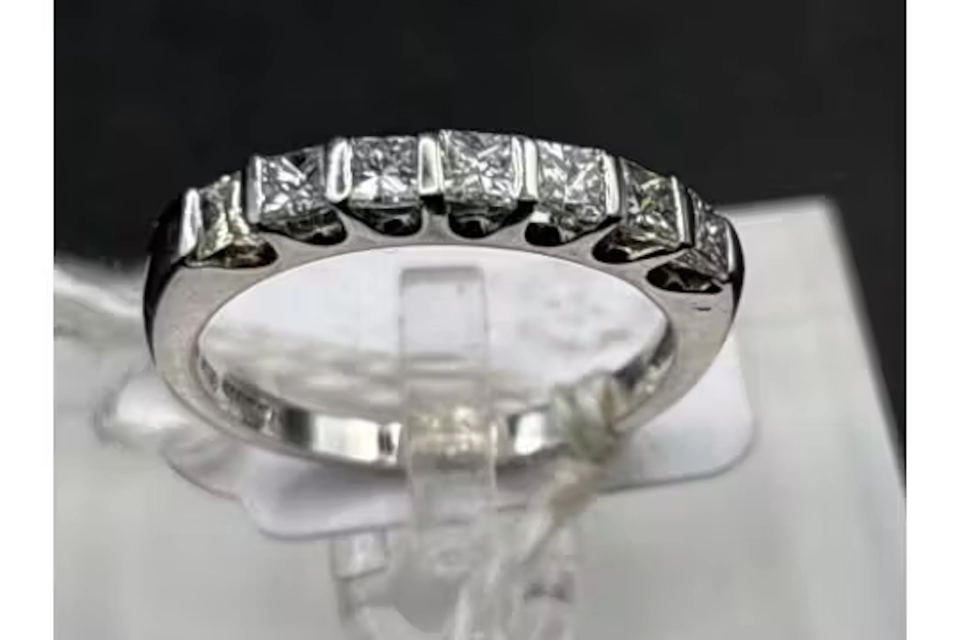 18ct white gold diamond half eternity ring set with 7 princess cut