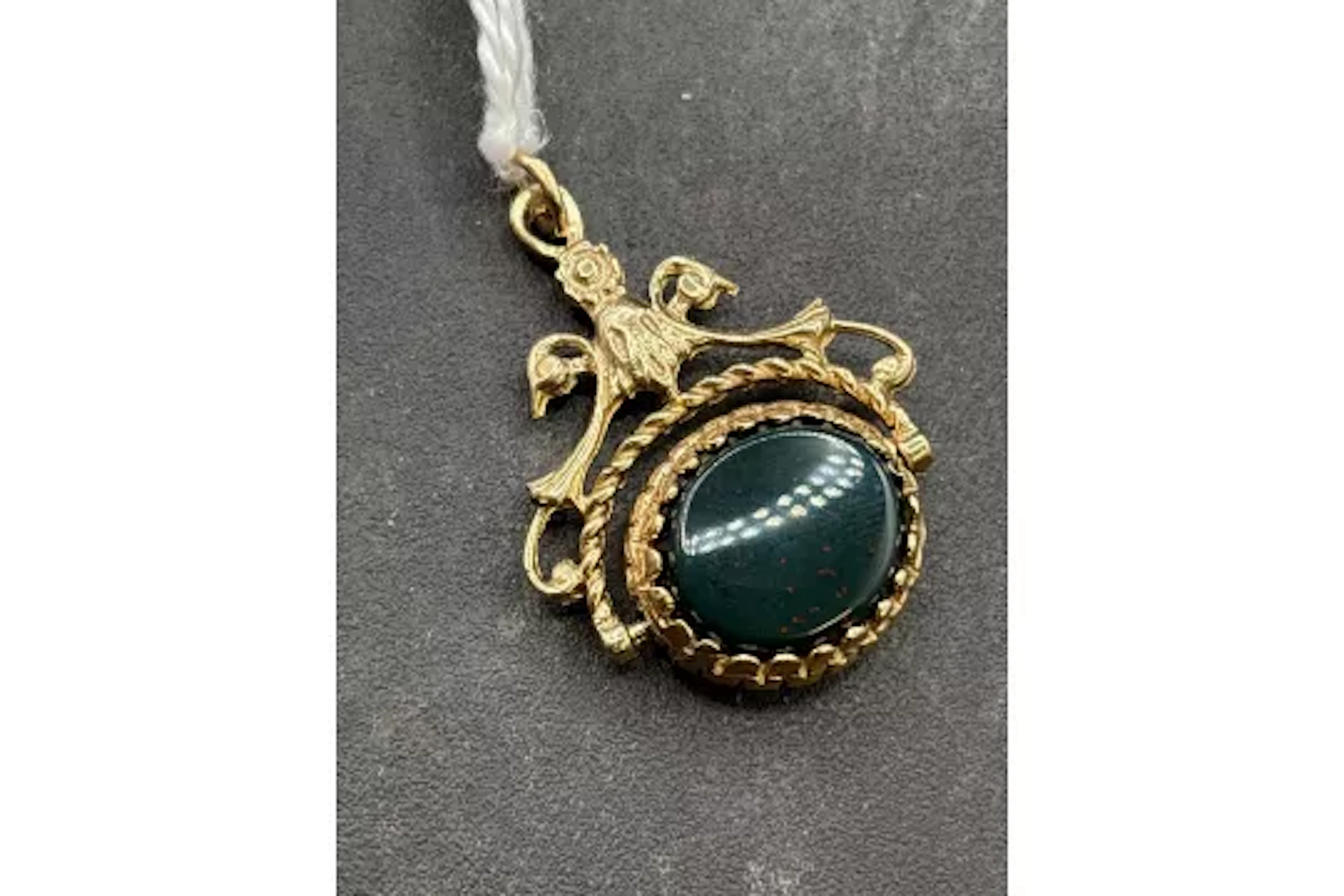 A bloodstone and tigers eye spinning fob 9ct 5.6 gms