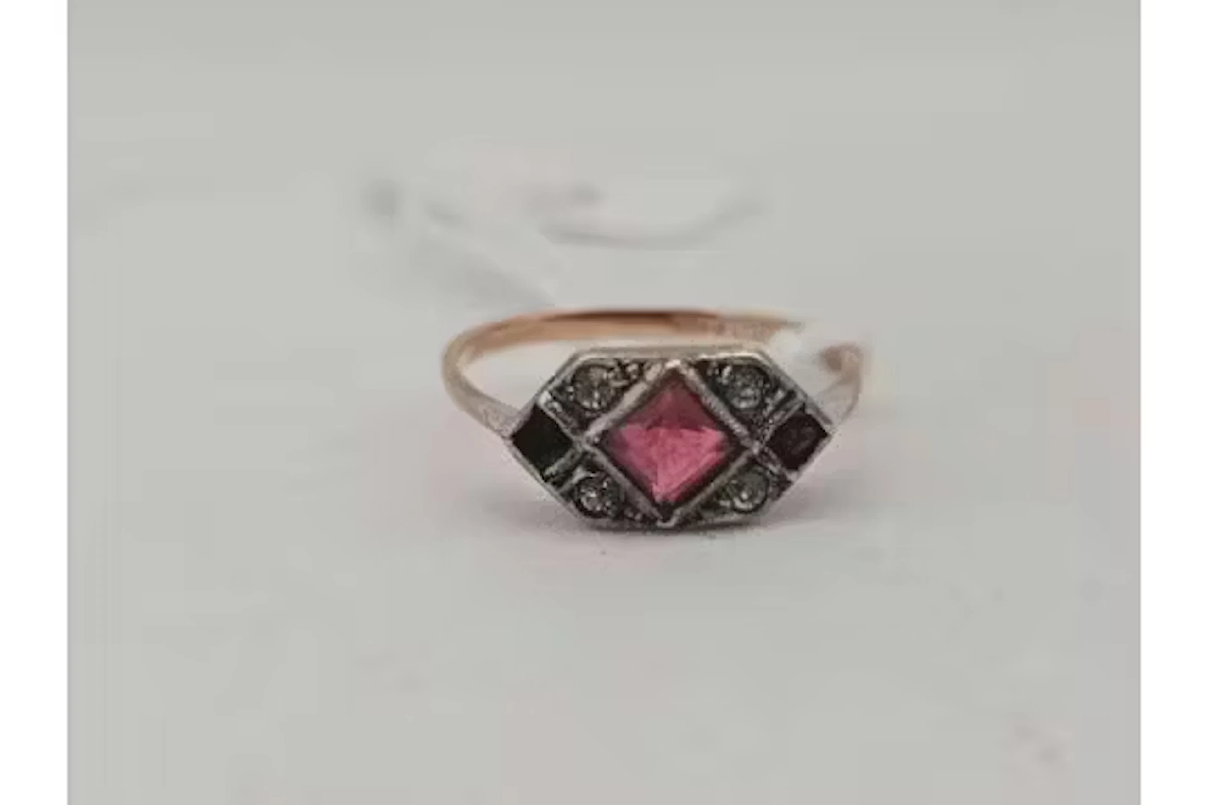 A antique paste ring 9ct with silver head size K