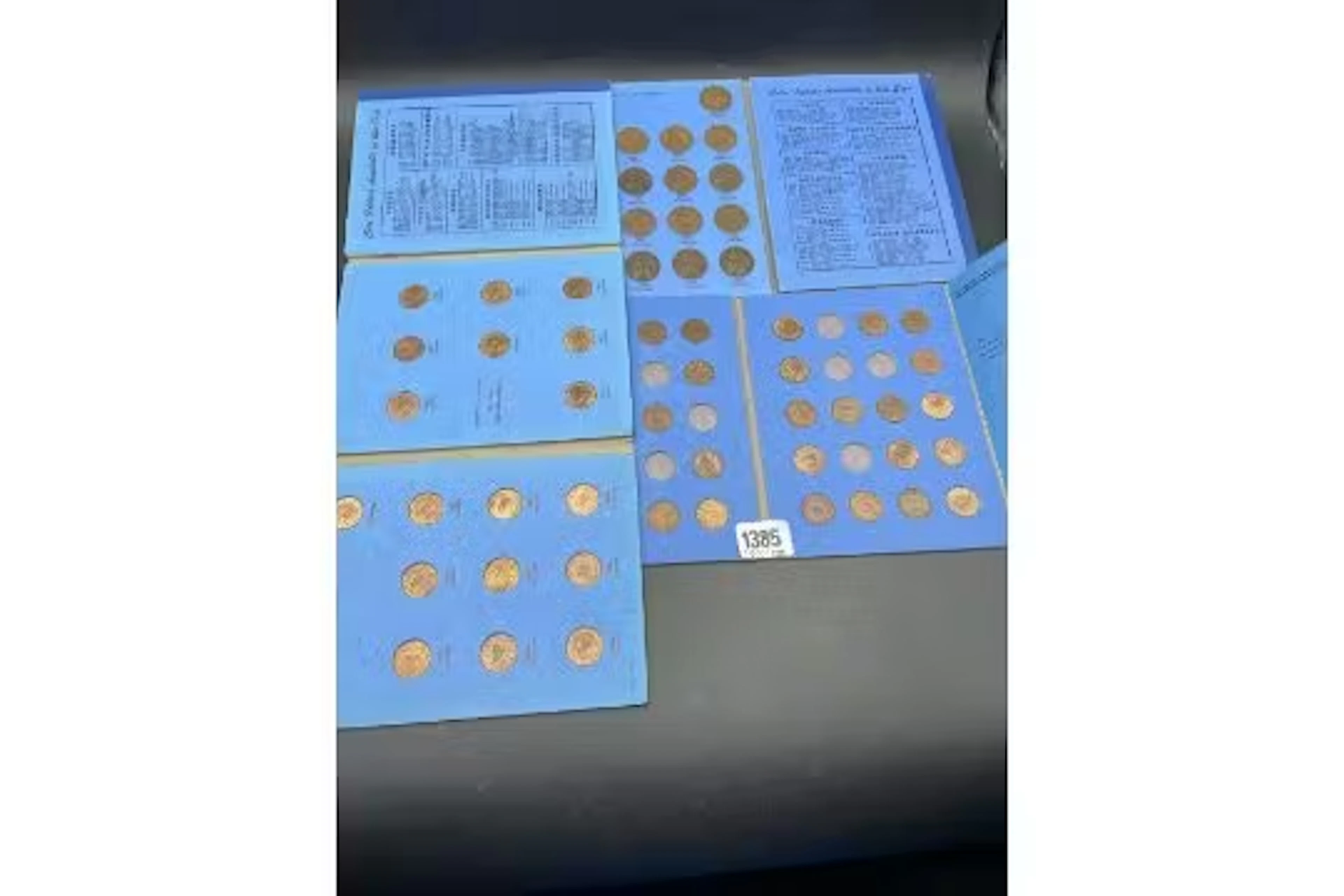 Farthings and half pennies in folder