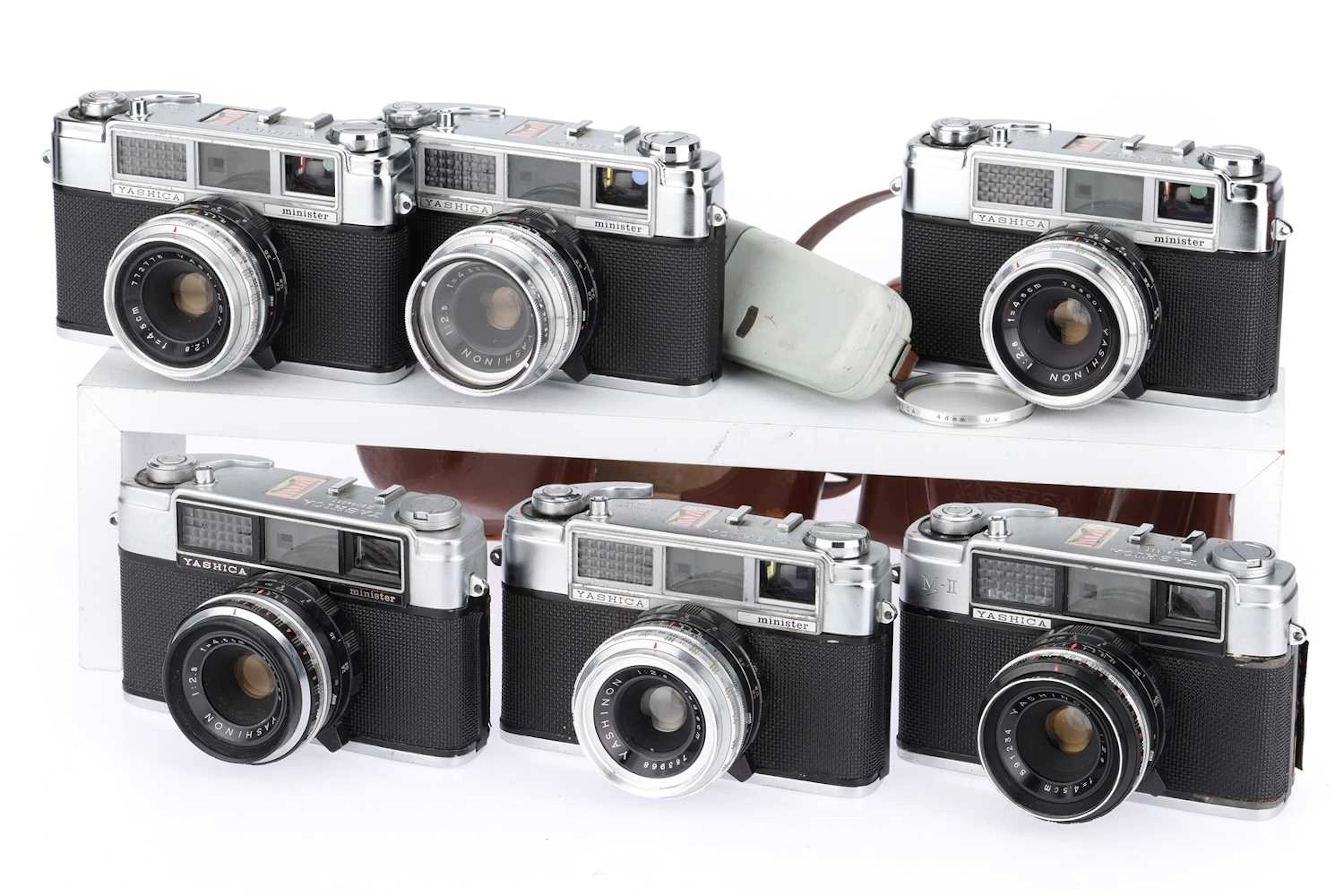 Six Yashica Minister Series 35mm Rangefinder Cameras