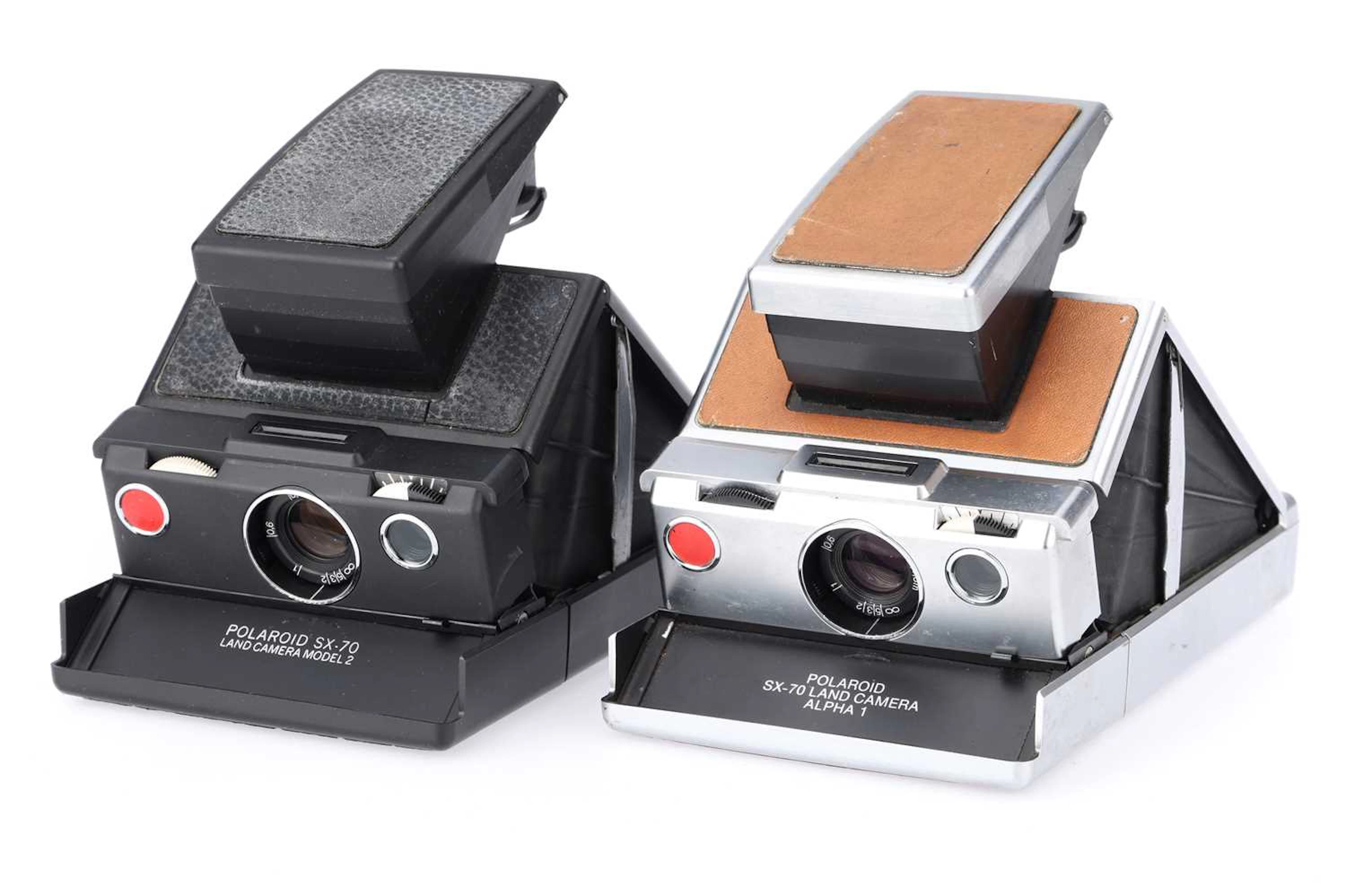 A Pair of Polaroid SX-70 Instant Film Cameras