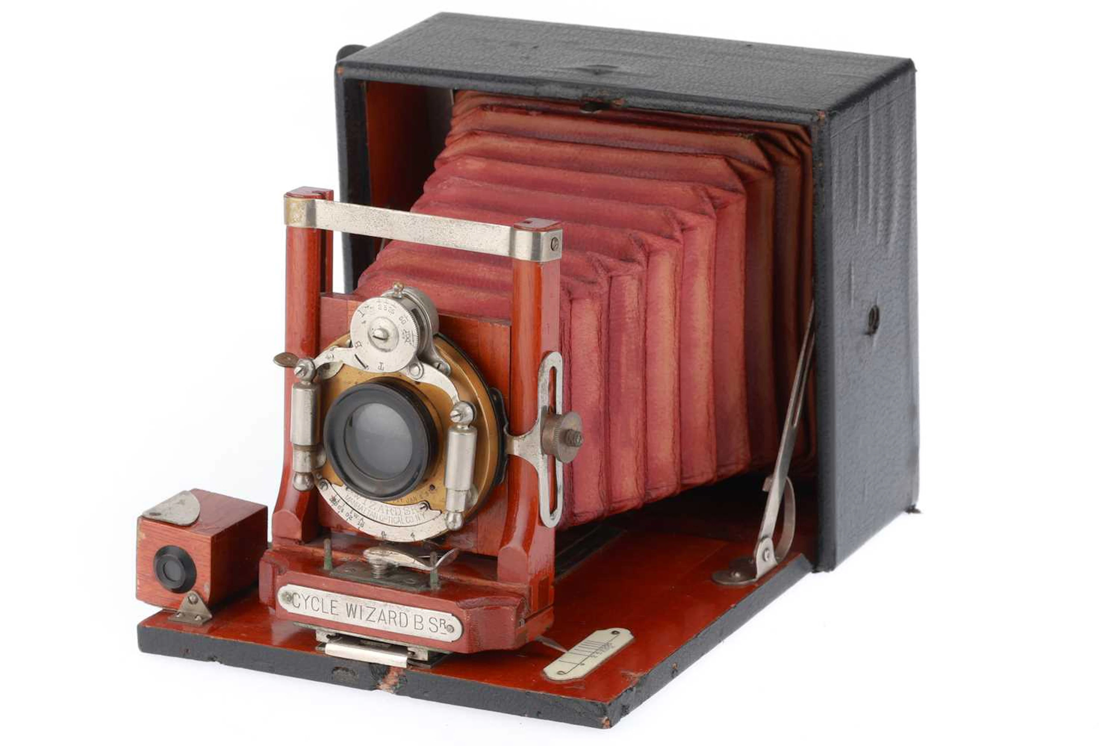 A Manhattan Cycle Wizard B. SR 4x5 Folding Camera