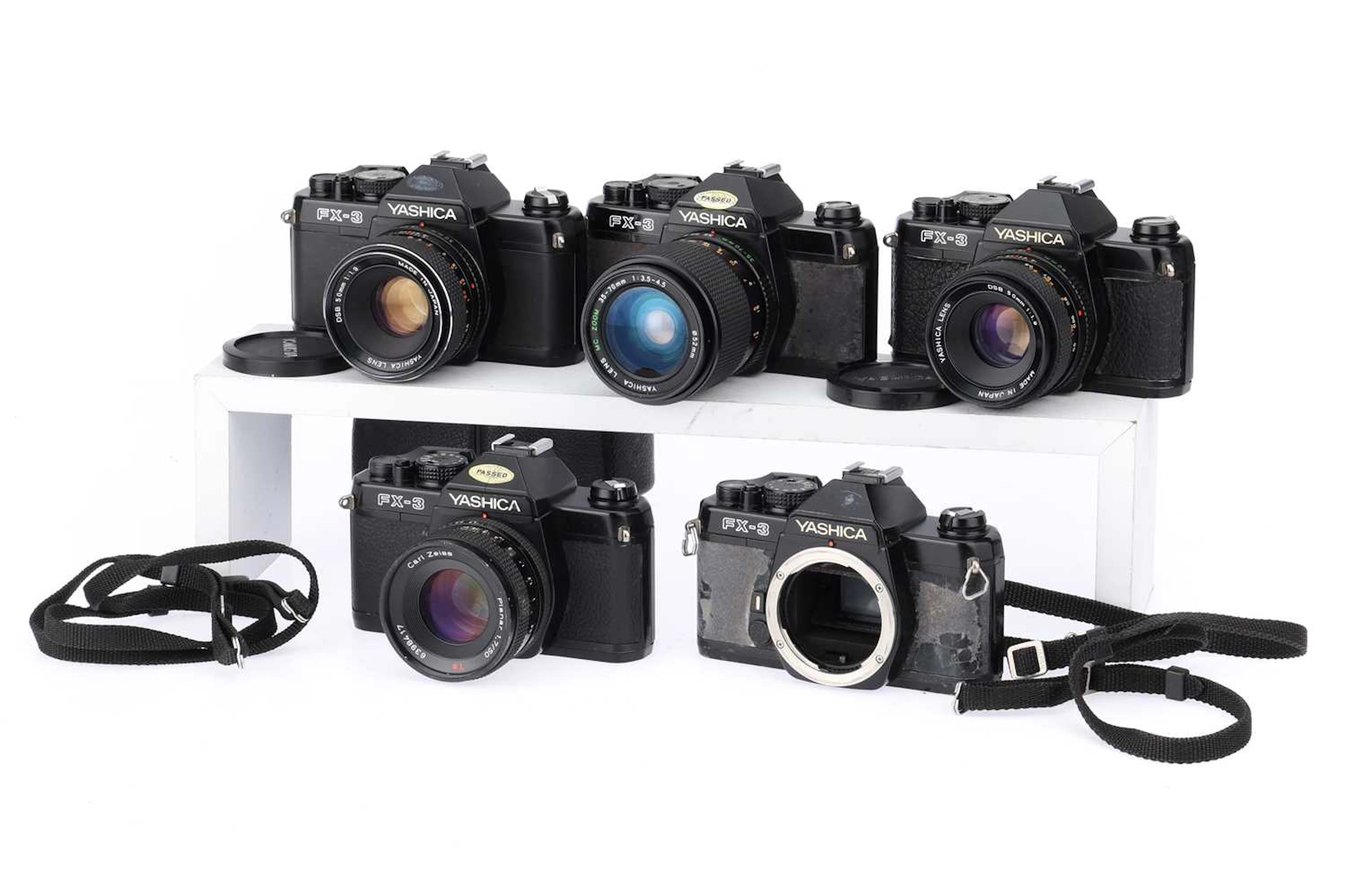 Five Yashica FX-3 35mm SLR Cameras