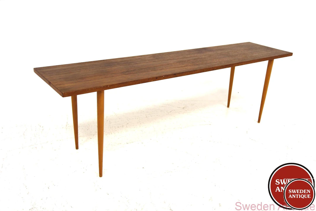 Side table Year: 1950s Origin: Swe. Material: Teak Beech W: 130cm