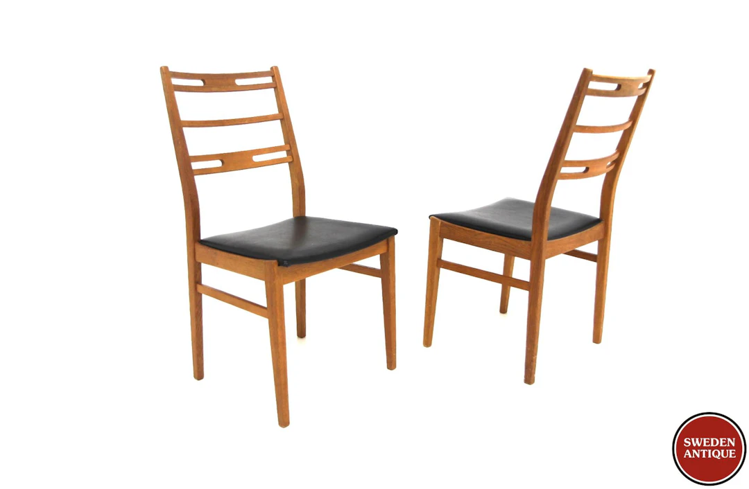 2Pcs Chairs Year: 1960s Origin: Swe. Material: Oak Vinyl W: 46cm D: