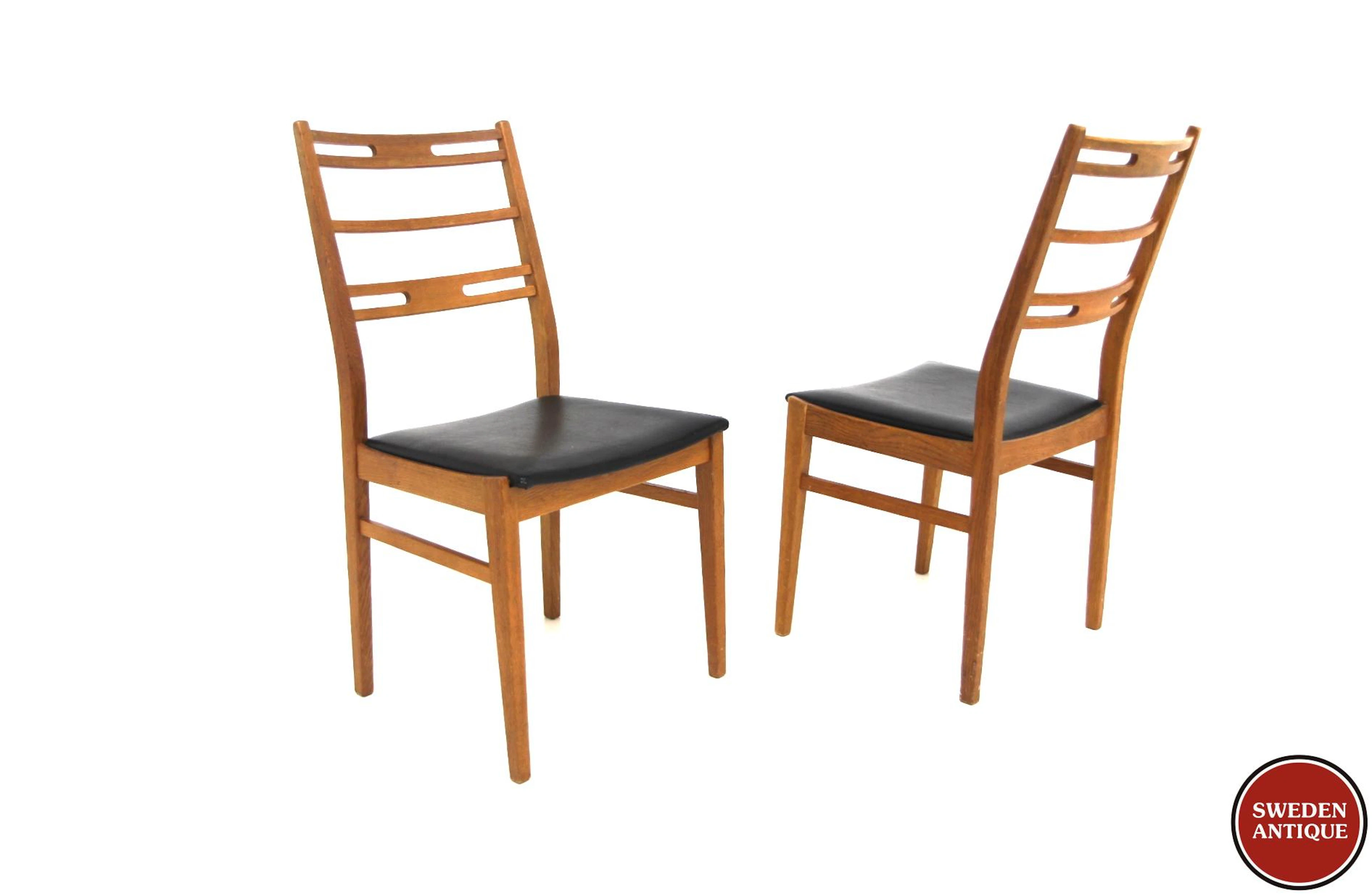 2Pcs Chairs Year: 1960s Origin: Swe. Material: Oak Vinyl W: 46cm D: