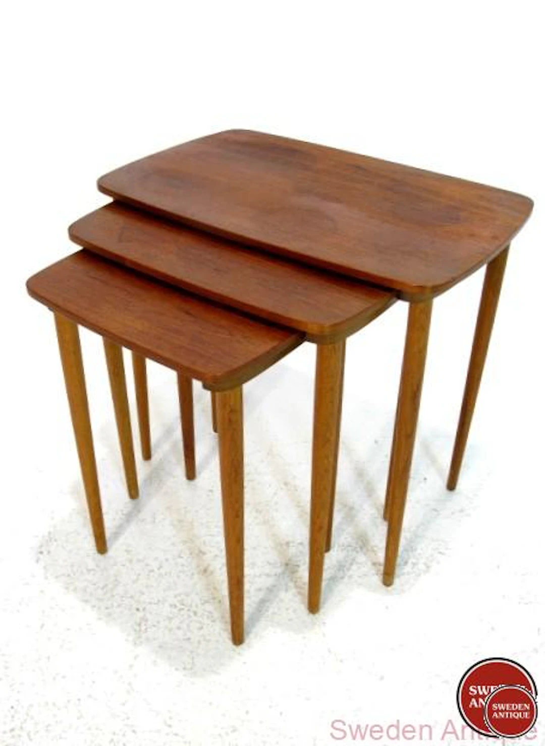 Nesting table Year: 1960s Origin: Swe. Material: Teak Beech W: 58,5cm