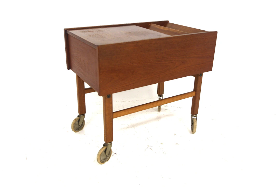 Magazin stand / Sewing table Year: 1960s Origin: Swe. Material: Teak