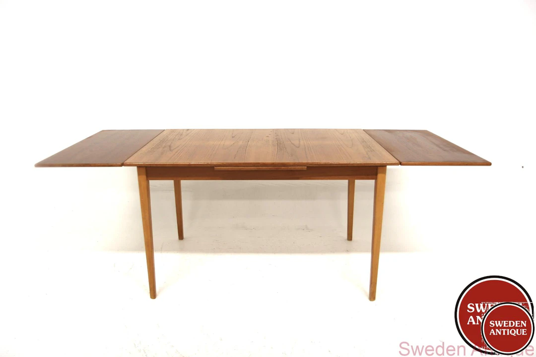 Dining table Year: 1960s Origin: Swe. Material: Teak Beech W: 120