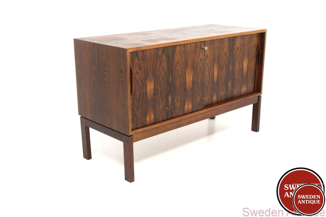Cabinet Year: 1960s Origin: Swe. Material: Rosewood W: 107cm D: 43cm H: 65cm