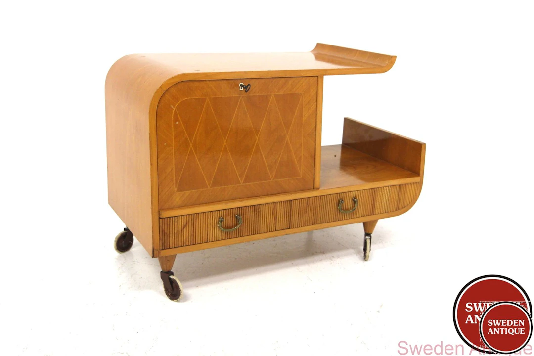 Side table Swedish Modern Year: 1940s Origin: Swe. Material: Elm Metal