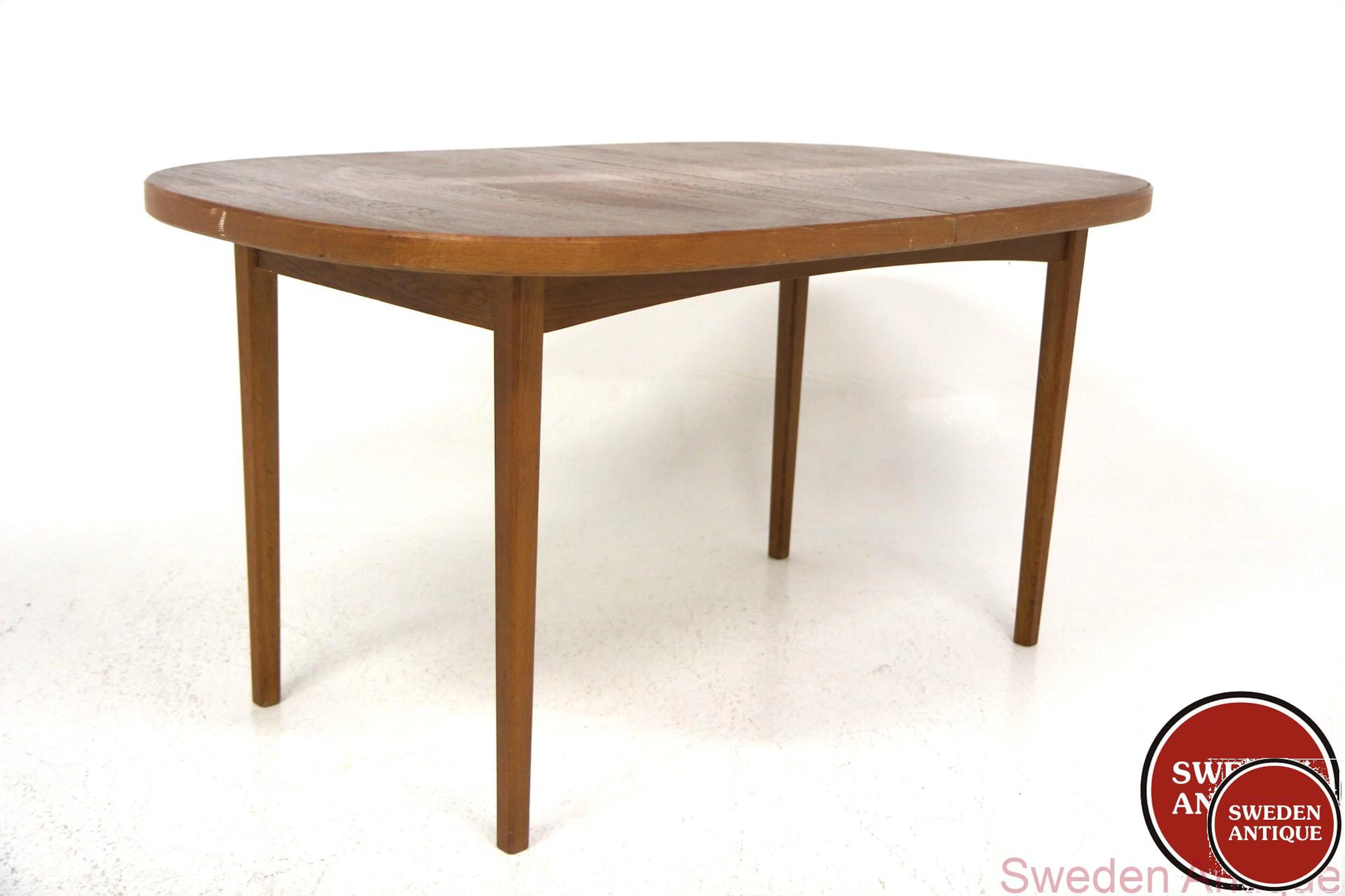 Dining table Year: 1960s Origin: Swe. Material: Teak Oak W: 145cm
