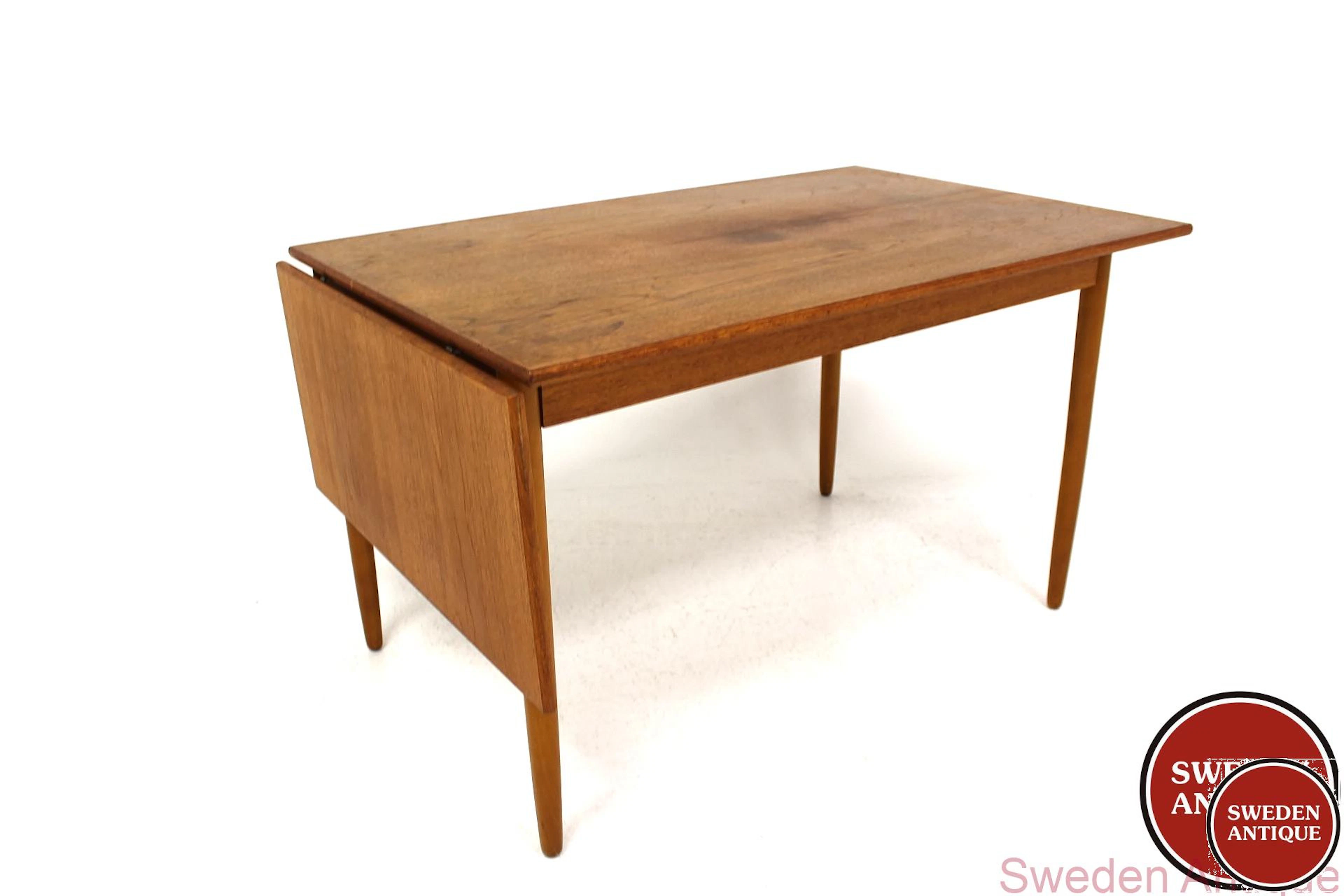 Dining table Year: 1960s Origin: Swe. Material: Teak Beech W: 124