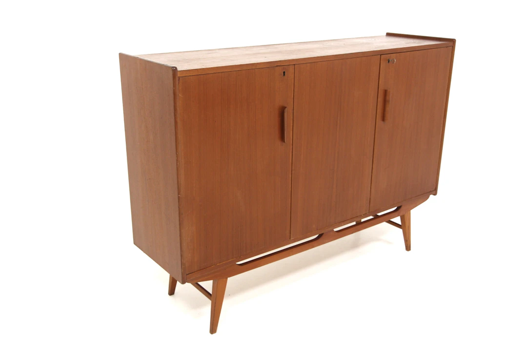 Sideboard / Highboard Year: 1950s Origin: Swe. Material: Teak Beech