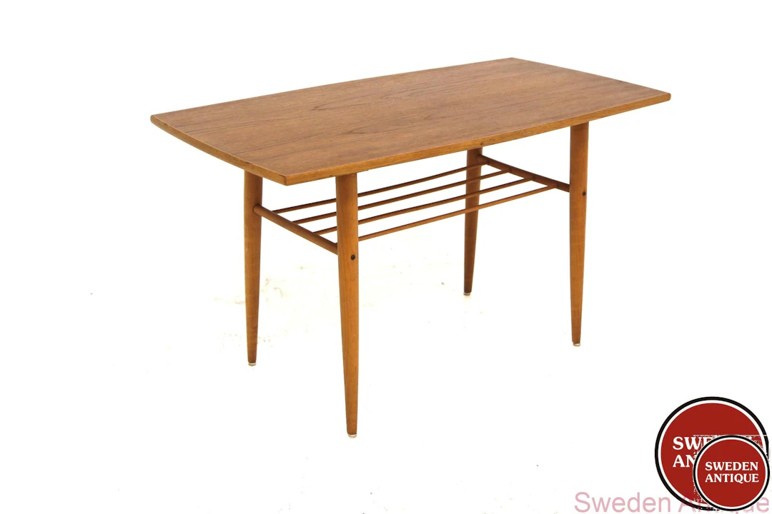 Coffee table Year: 1950s Origin: Swe. Material: Teak Beech W: 99cm