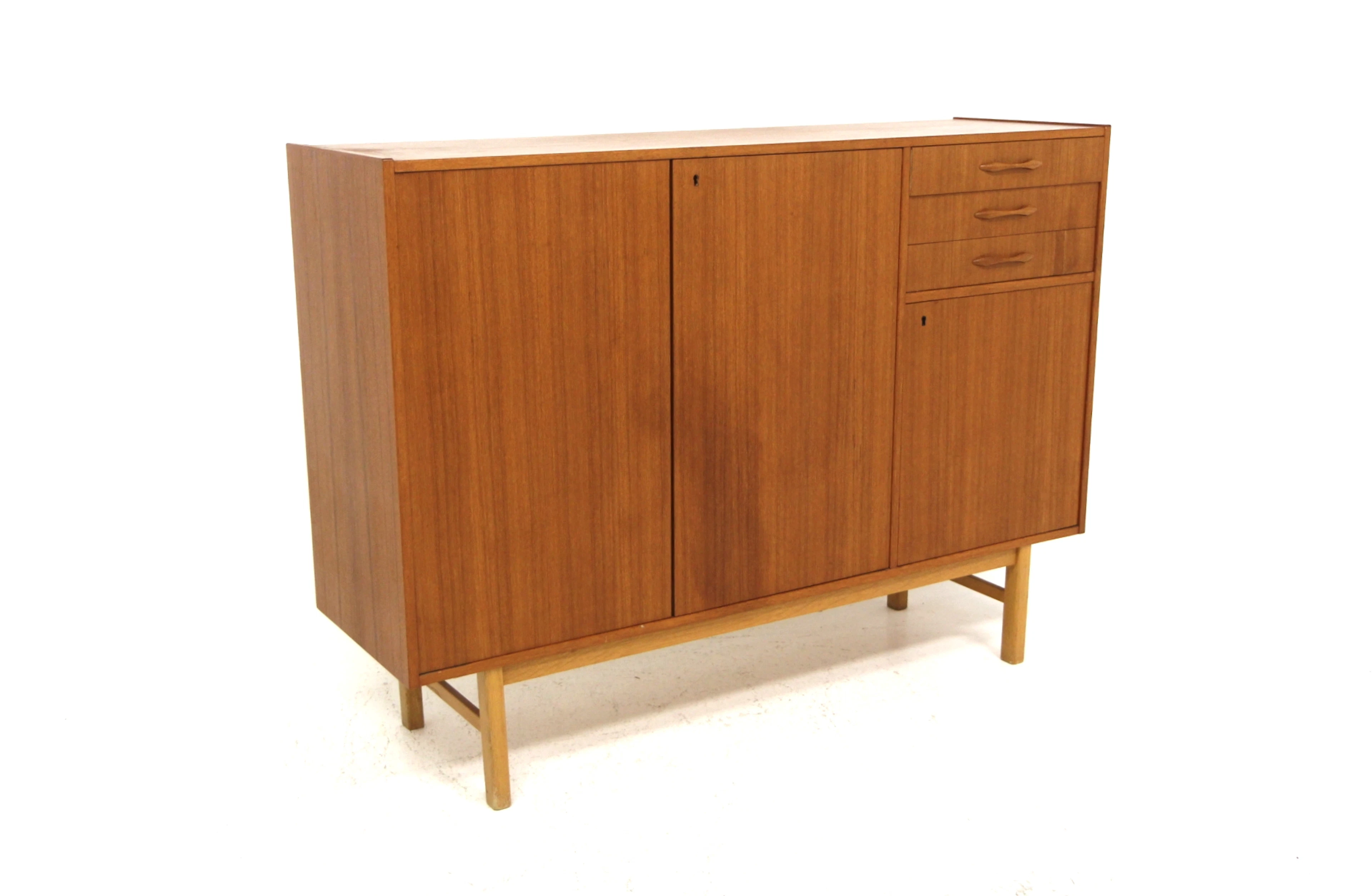 Sideboard Year: 1960s Origin: Swe. Material: Teak Oak W: 145cm D: 43cm H: 105cm