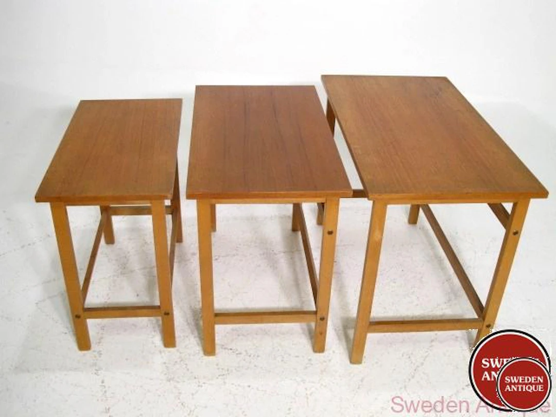 Nesting table Year: 1960s Origin: Swe. Material: Teak Beech W: 68,5cm