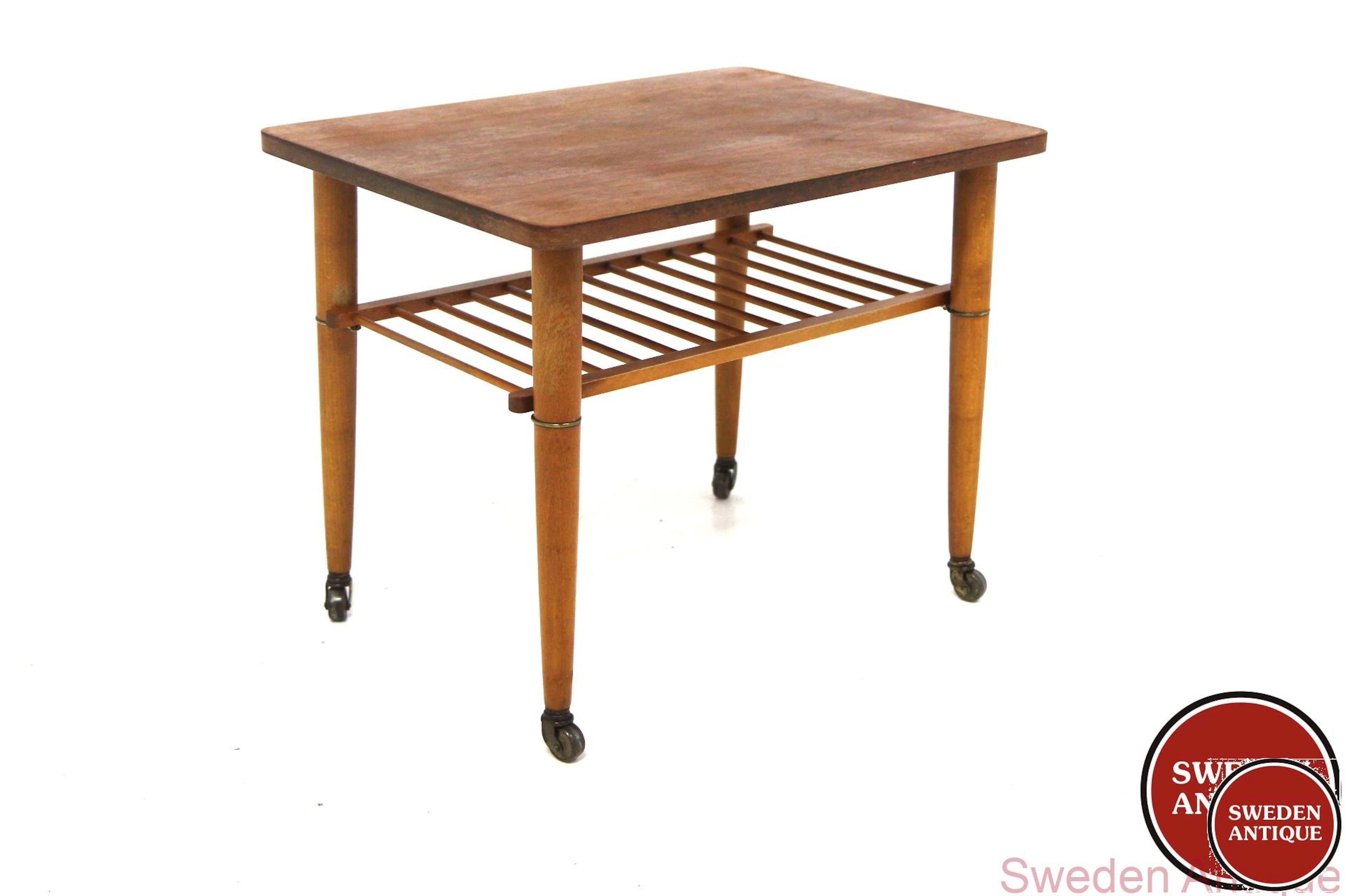 Side table Year: 1950s Origin: Swe. Material: Teak Beech Metal W:
